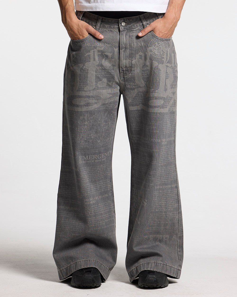 NEWSPAPER V3 PANTS  GREY - grey graphic print pants, front view on male model - Cold Culture