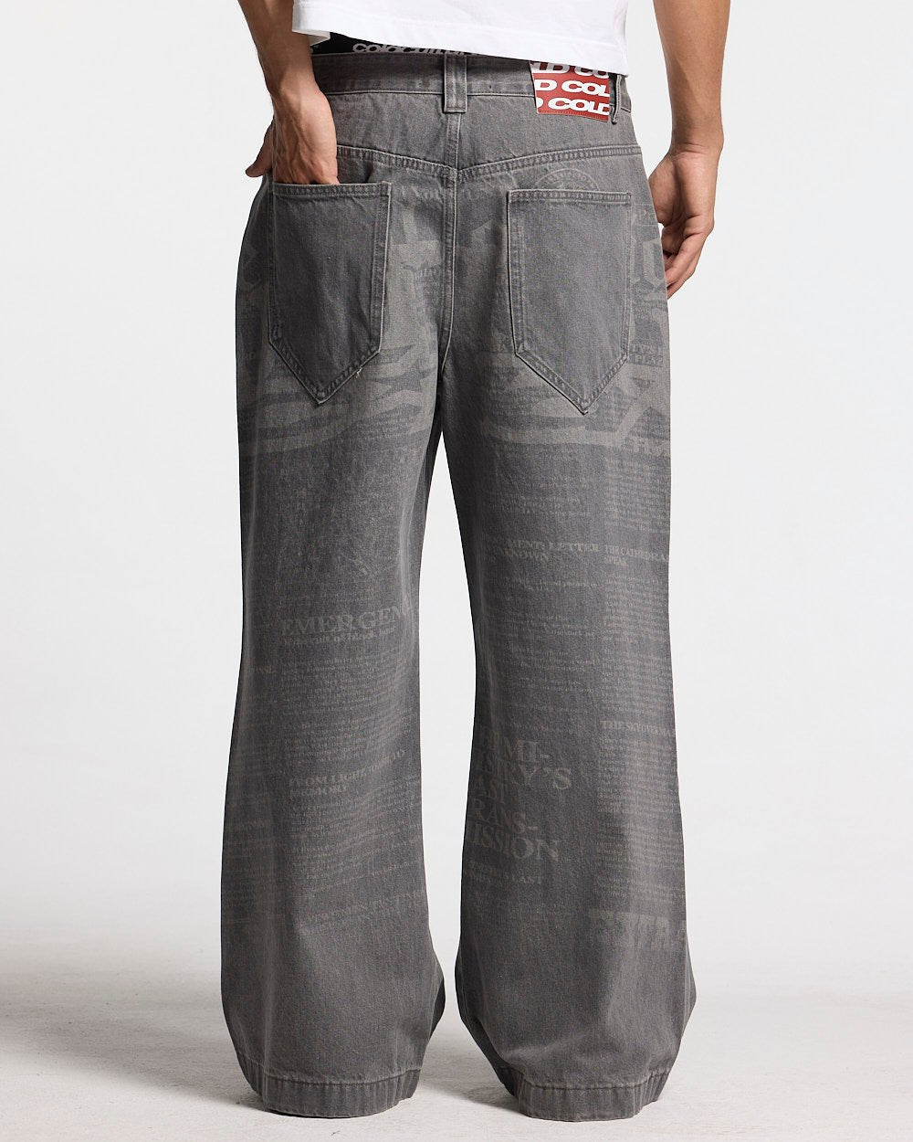 NEWSPAPER V3 PANTS  GREY - grey graphic print pants, on model close-up - Cold Culture