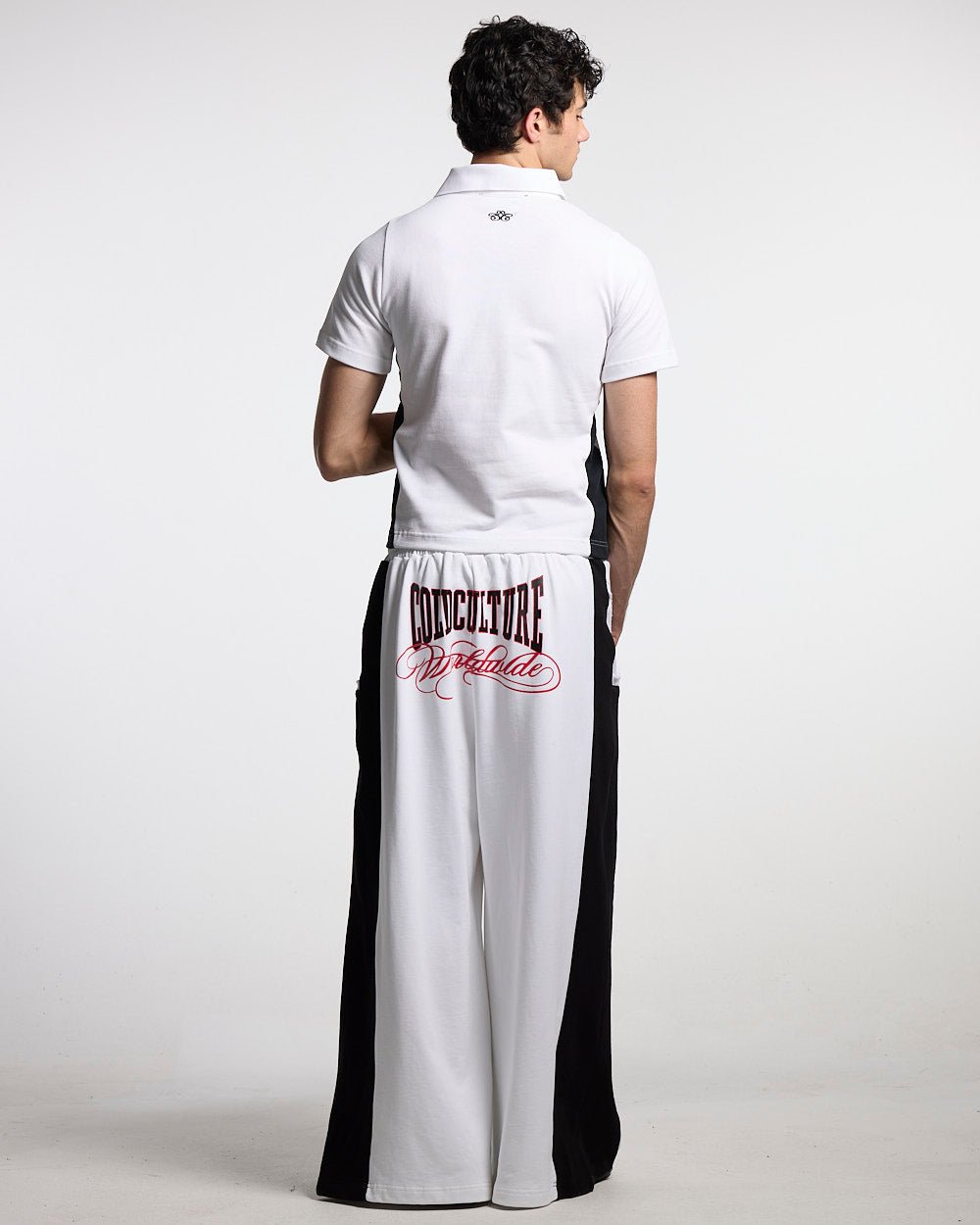 NIA SET POLO WHITE & BLACK - white and black polo shirt, back view on male model - Cold Culture #man