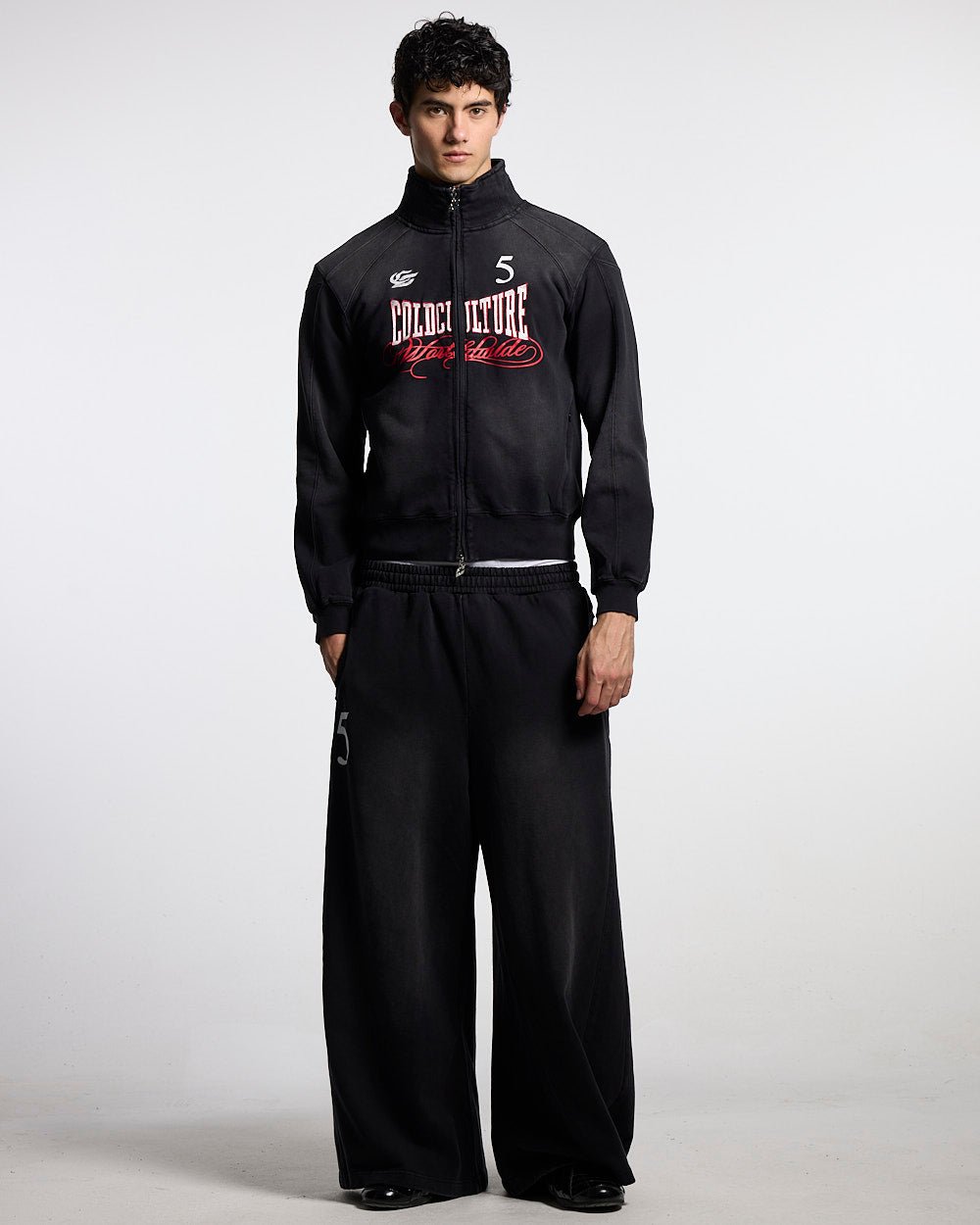 NIA SET SWEATPANTS BLACK - black wide-leg sweatpants, front view on male model - Cold Culture #man