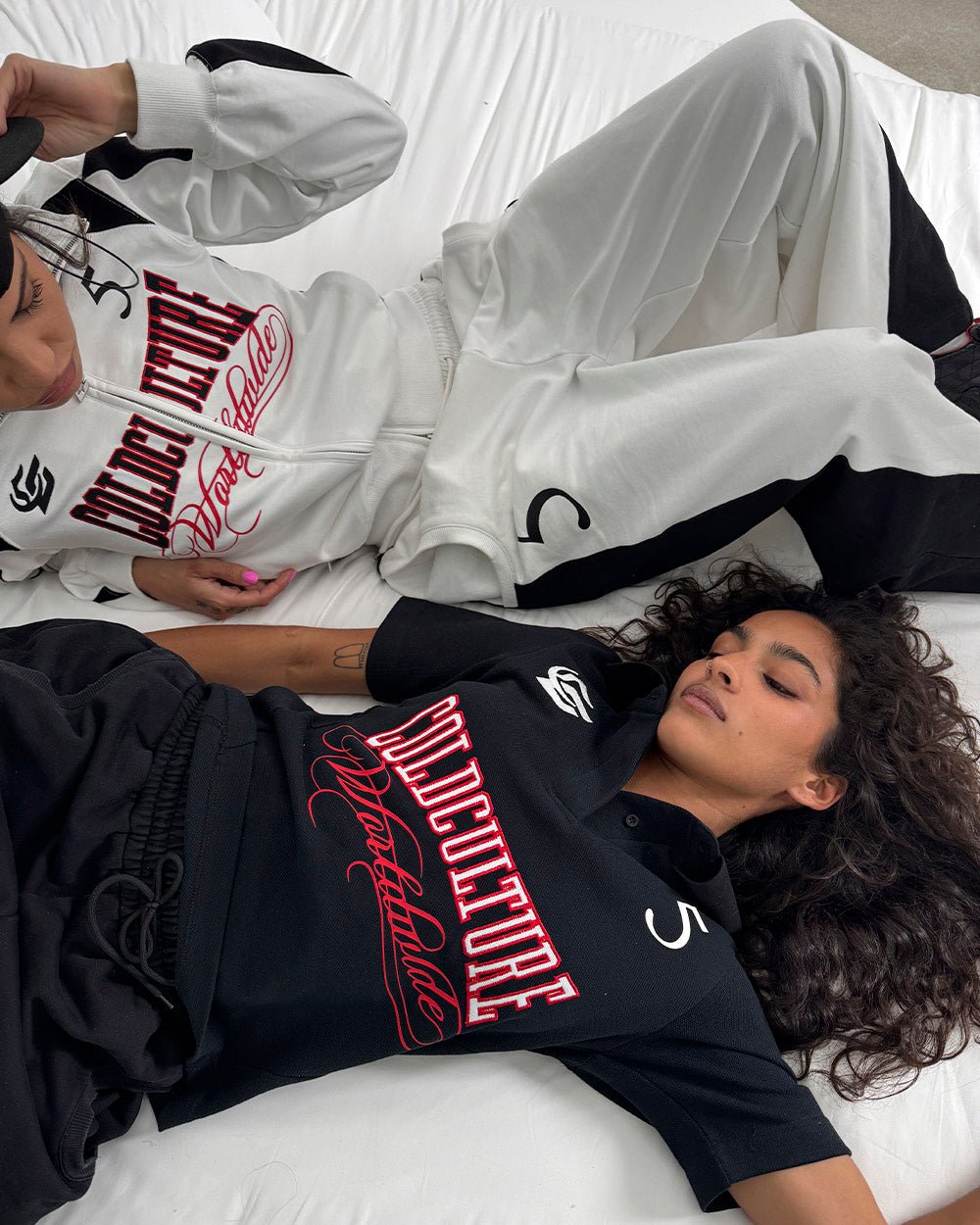 NIA SET SWEATPANTS WHITE & BLACK - white and black wide-leg sweatpants, street style shot - Cold Culture #woman