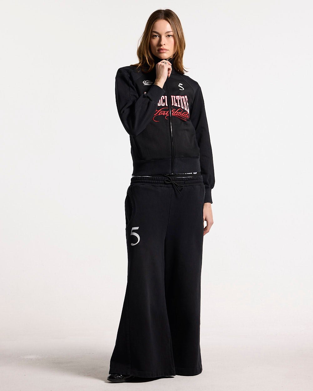 NIA SET ZIP UP BLACK - black graphic print zip-up hoodie, front view on female model - Cold Culture #woman