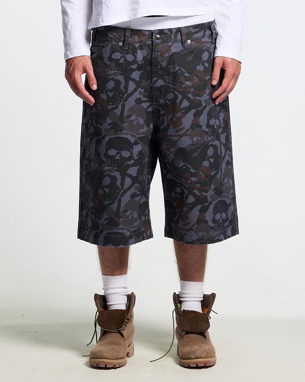 NIGHTSKULL SHORTS GREY - grey skull camo shorts, front view on male model - Cold Culture