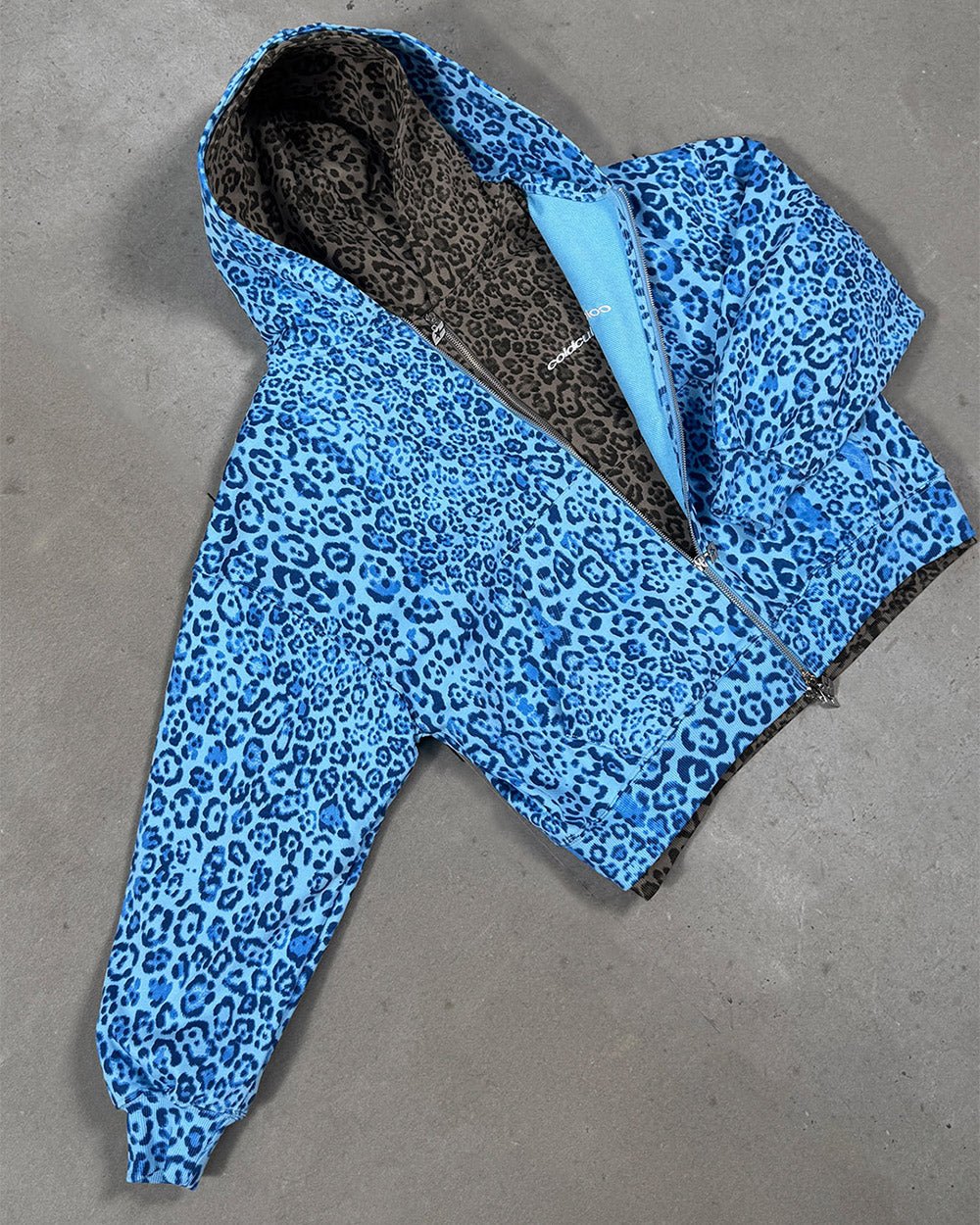 NOCTURNE BEAST ZIP HOODIE BLUE - blue leopard print zip-up hoodie, flat lay - Cold Culture
