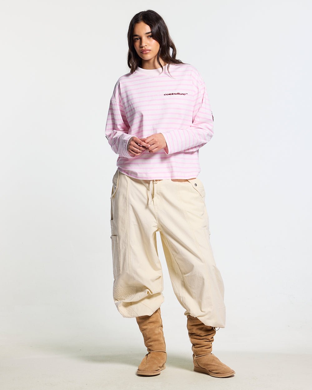 NORTH STARS LONGSLEEVE PINK - pink striped longsleeve tee, front view on female model - Cold Culture #woman