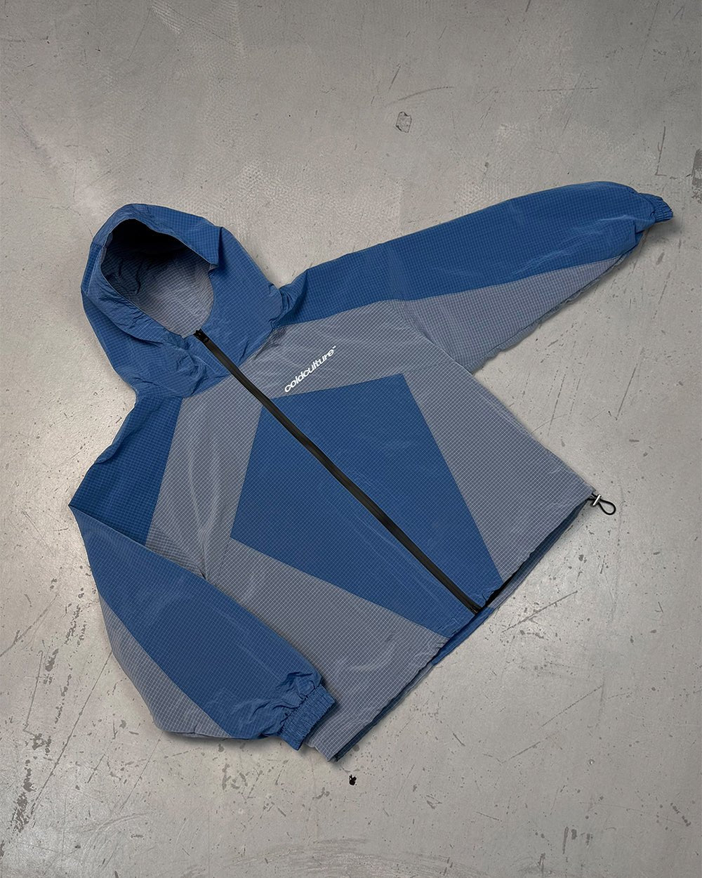 NOT FORMAL JACKET BLUE - blue colorblock hooded jacket, flat lay - Cold Culture