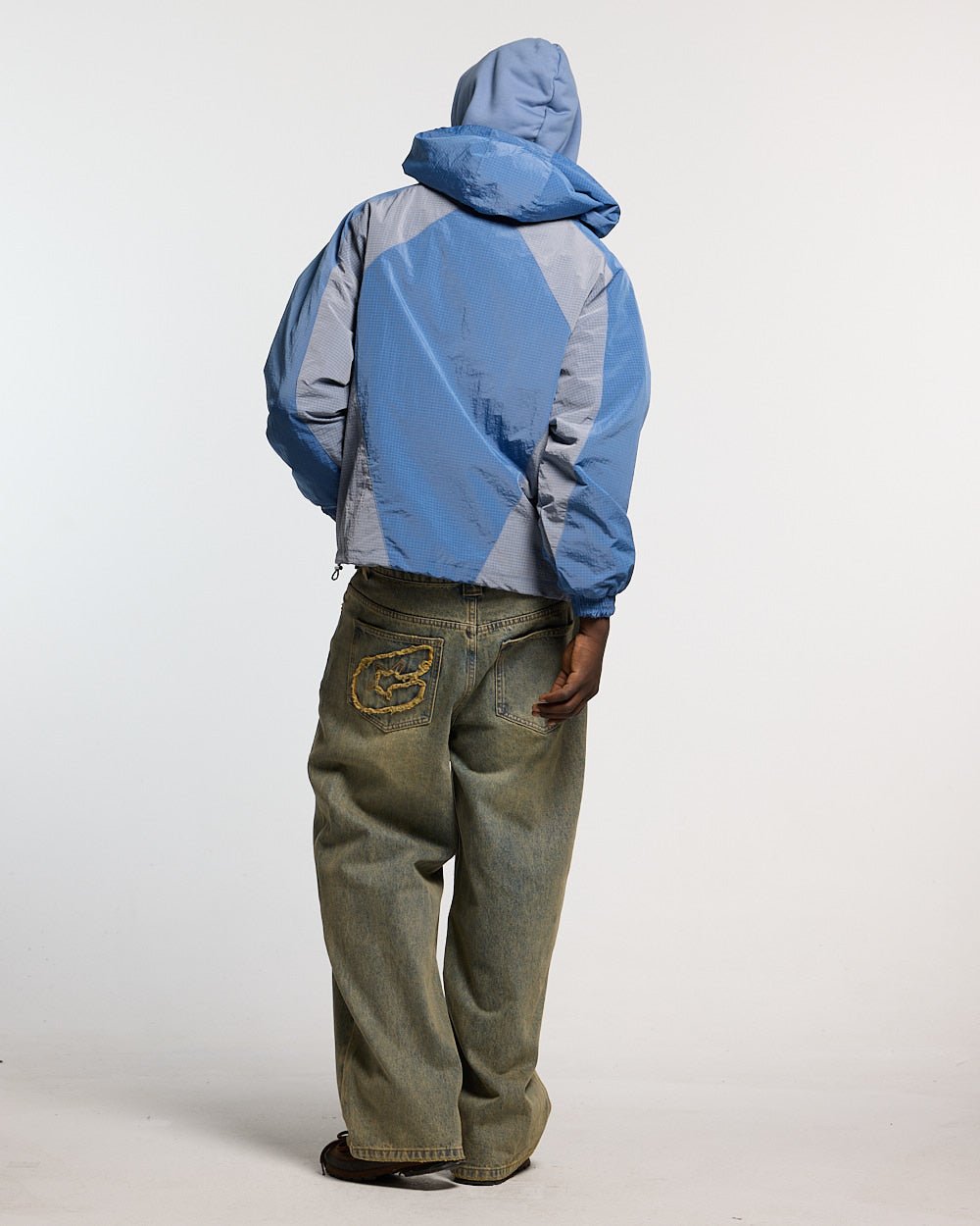 NOT FORMAL JACKET BLUE - blue colorblock hooded jacket, back view on male model - Cold Culture