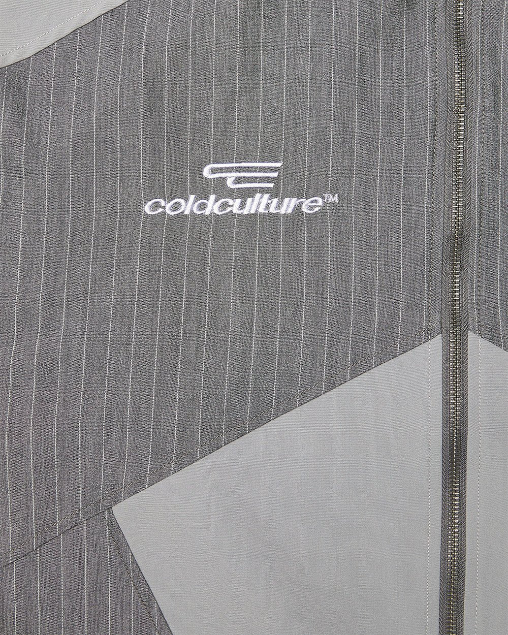 NOT FORMAL SET JACKET GREY - grey pinstripe track jacket, detail close-up - Cold Culture