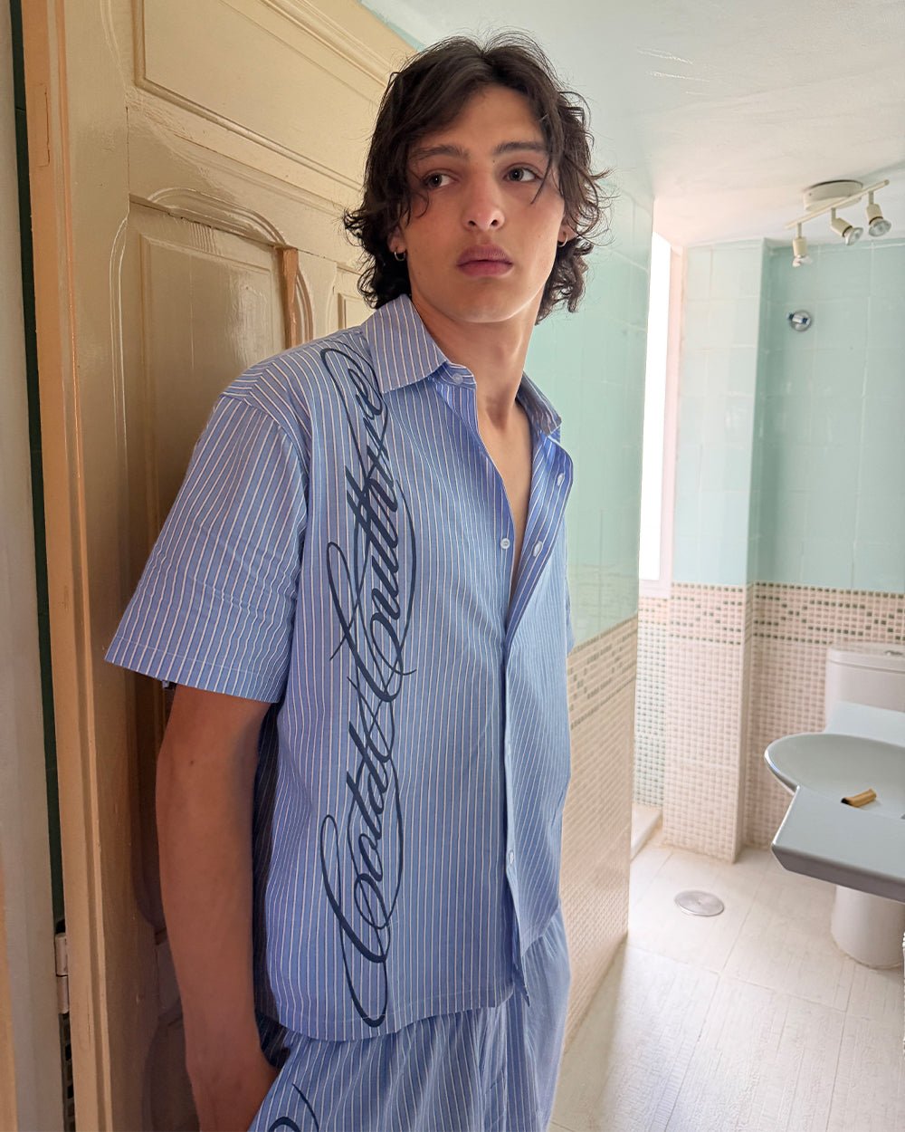 OFFICE SCRIPT SHIRT BLUE - blue striped short sleeve shirt, street style shot - Cold Culture