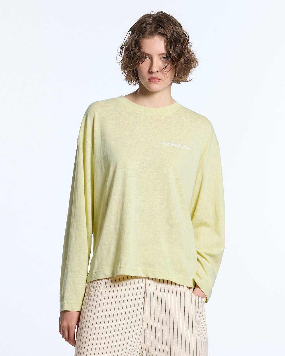 OLD SOUL LONGSLEEVE PALE YELLOW - pale yellow graphic print longsleeve tee, front view on female model - Cold Culture #woman