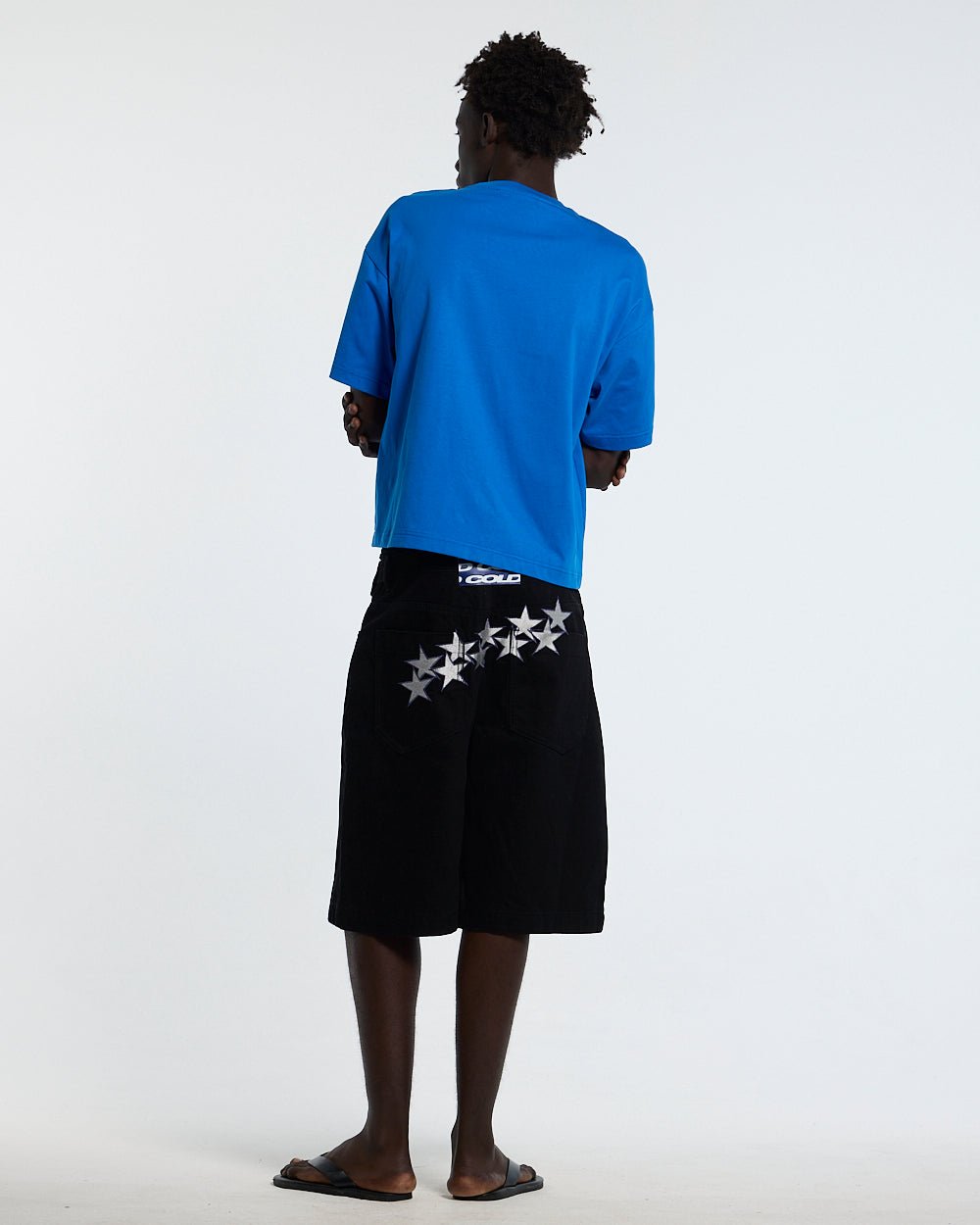 OOPS! TEE BLUE - blue graphic print tee, back view on male model - Cold Culture #man