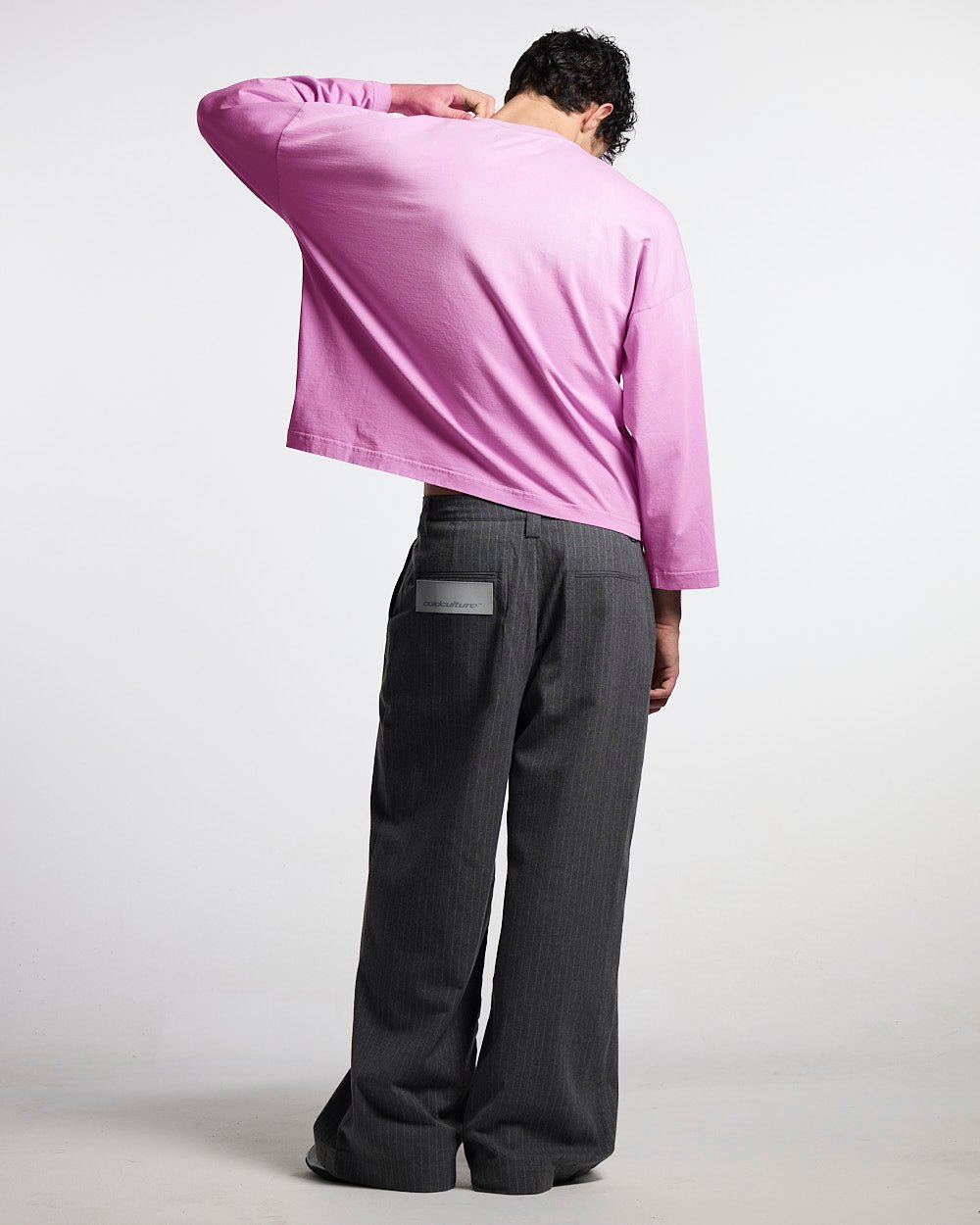 OUT OF THE OFFICE LONGSLEEVE PINK - pink graphic print longsleeve tee, back view on male model - Cold Culture #man