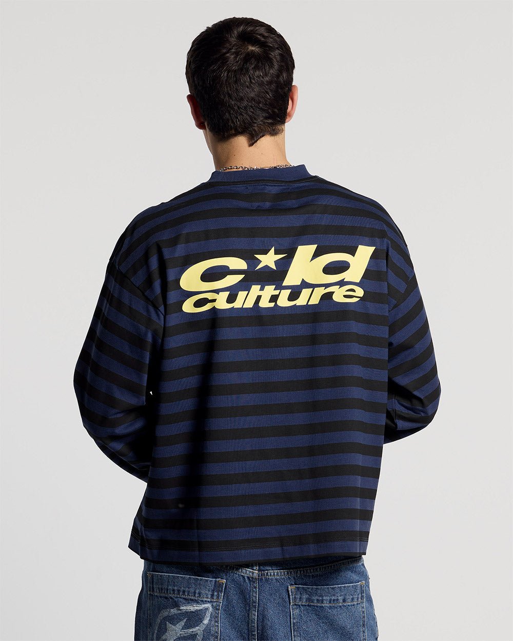 PARDON ME LONGSLEEVE BLACK & BLUE - black and blue striped longsleeve tee, back view on male model - Cold Culture #man