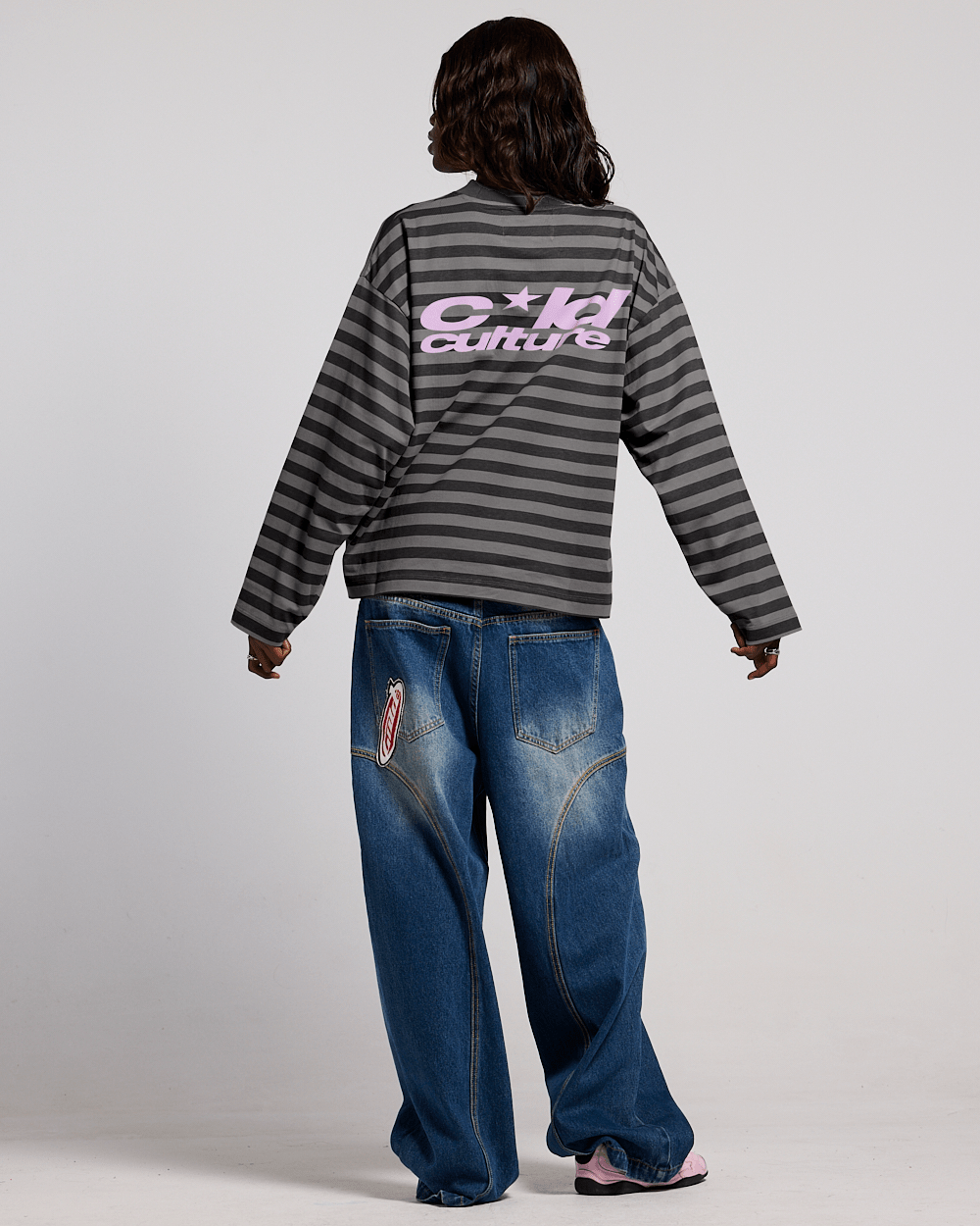 PARDON ME LONGSLEEVE BLACK & GREY - grey and black striped longsleeve tee, back view on female model - Cold Culture #woman