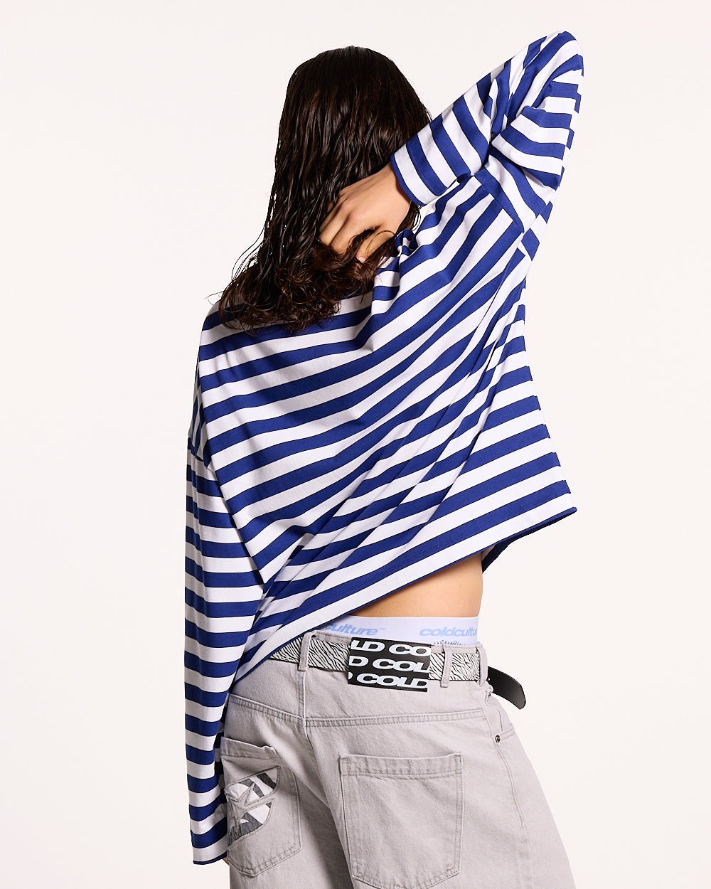 PARDON ME LONGSLEEVE WHITE & NAVY - navy striped longsleeve tee, back view on female model - Cold Culture #woman