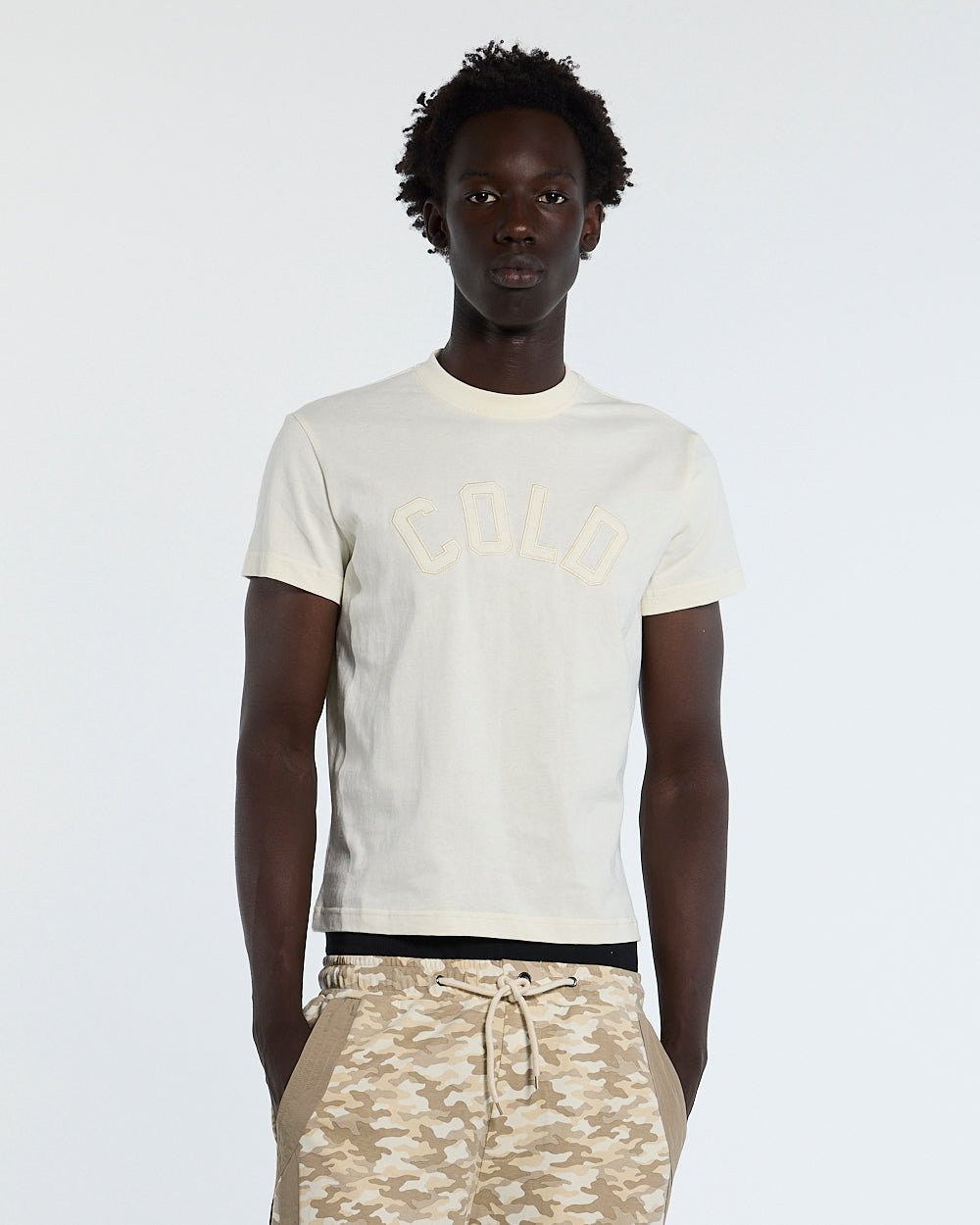 PIECES TEE OFF-WHITE - off-white applique tee, front view on male model - Cold Culture #man
