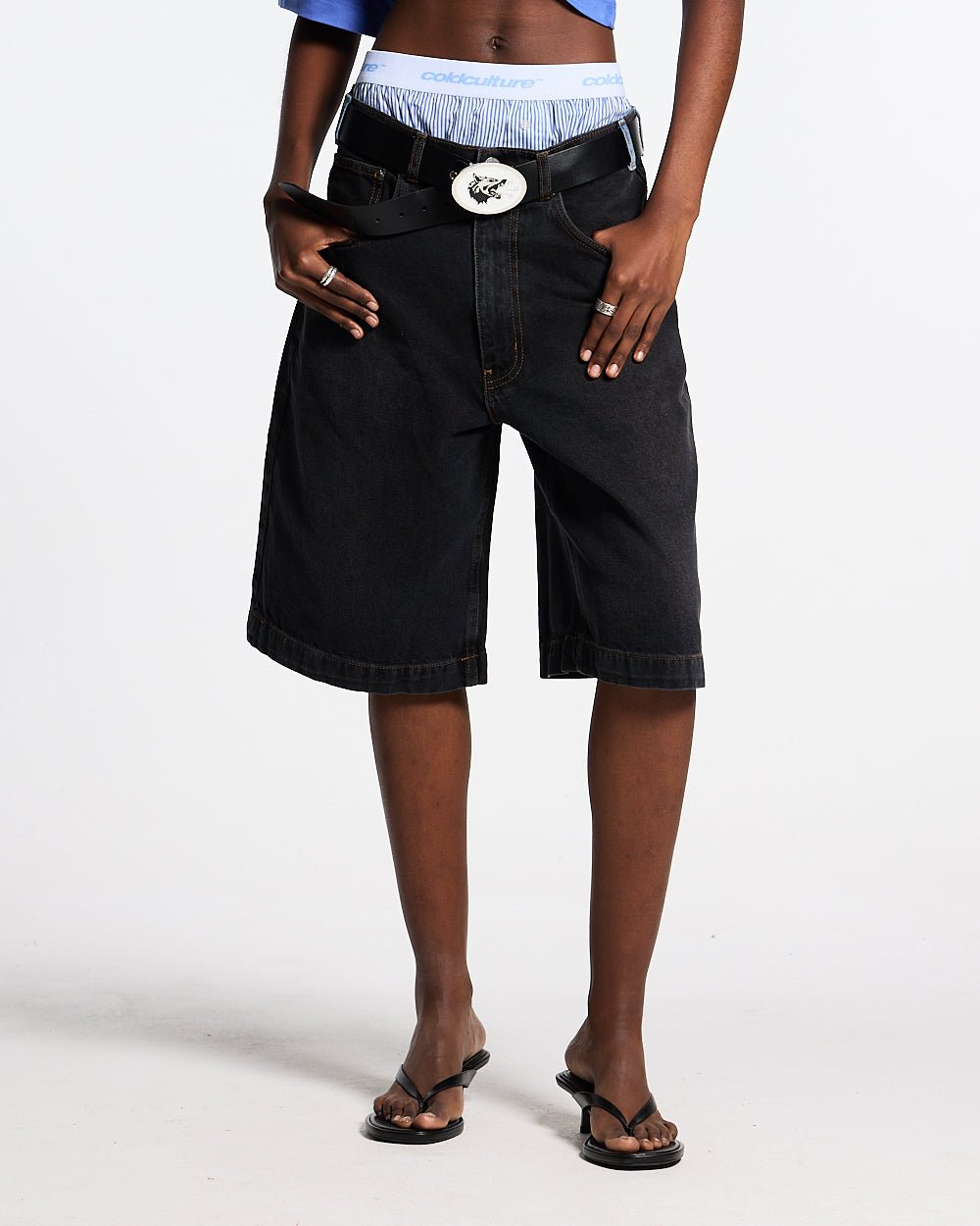 POCKET KO SHORTS BLACK DENIM - washed black denim shorts, front view on female model - Cold Culture #woman