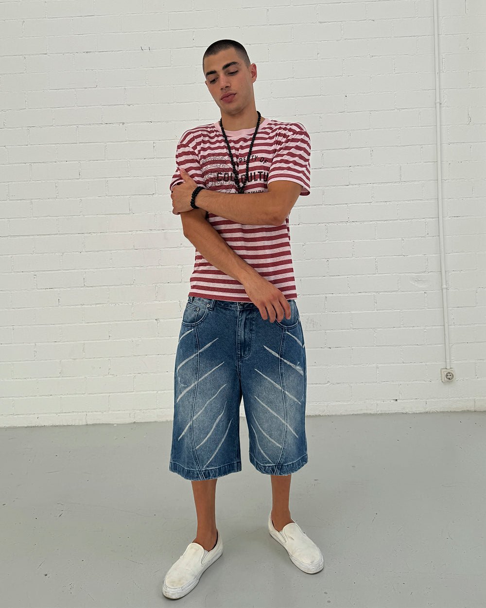 PROPERTY TEE PINK - pink striped tee, front view on male model - Cold Culture