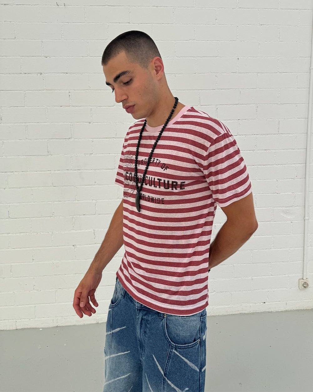 PROPERTY TEE PINK - pink striped tee, side view - Cold Culture #man