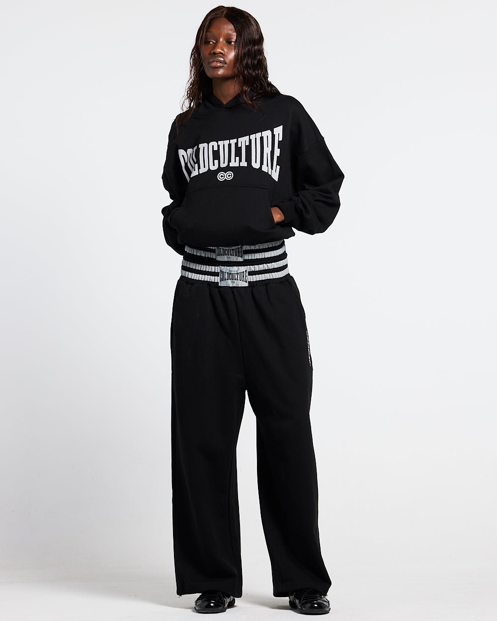 RAGE IN THE RING PANTS  BLACK - black baggy sweatpants, front view on female model - Cold Culture #woman