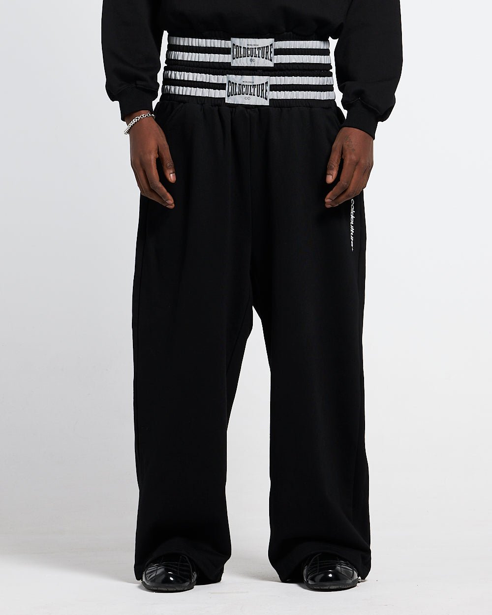 RAGE IN THE RING PANTS  BLACK - black baggy sweatpants, front view on male model - Cold Culture