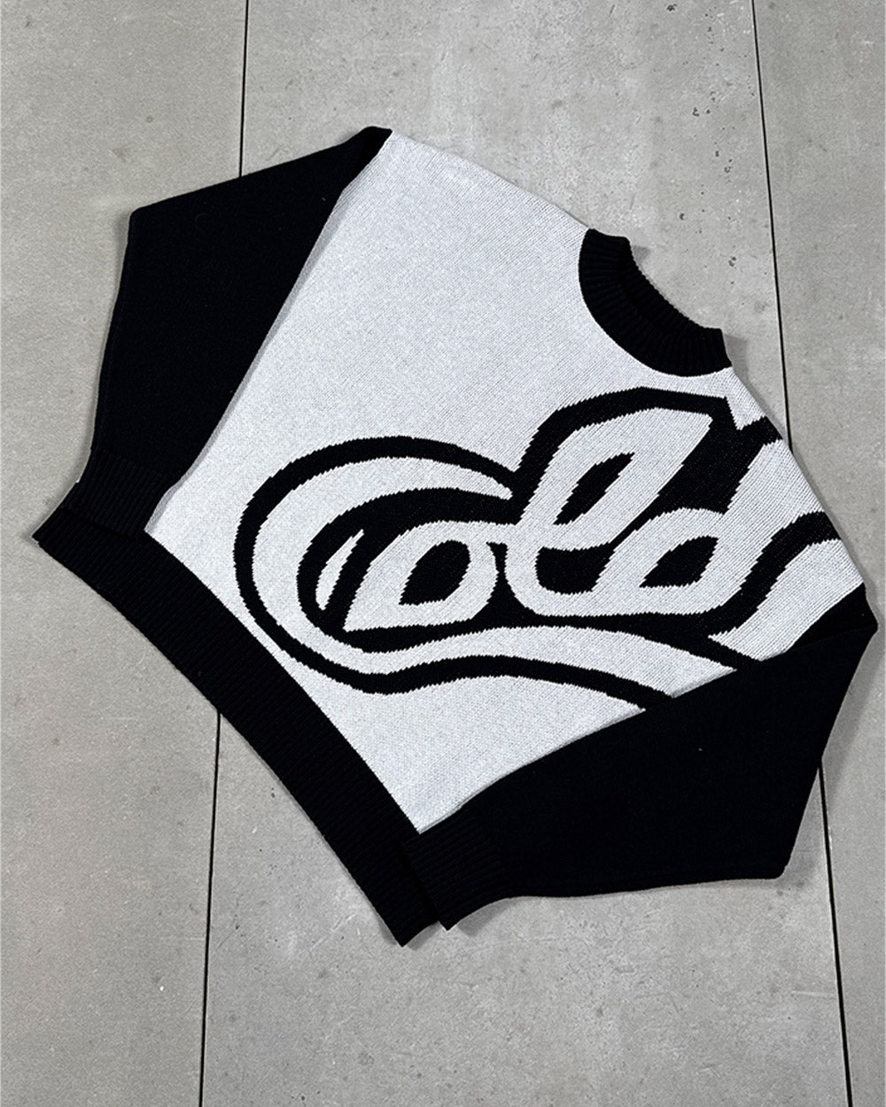 RAGE KNIT GREY - grey and black script knit sweater, flat lay - Cold Culture