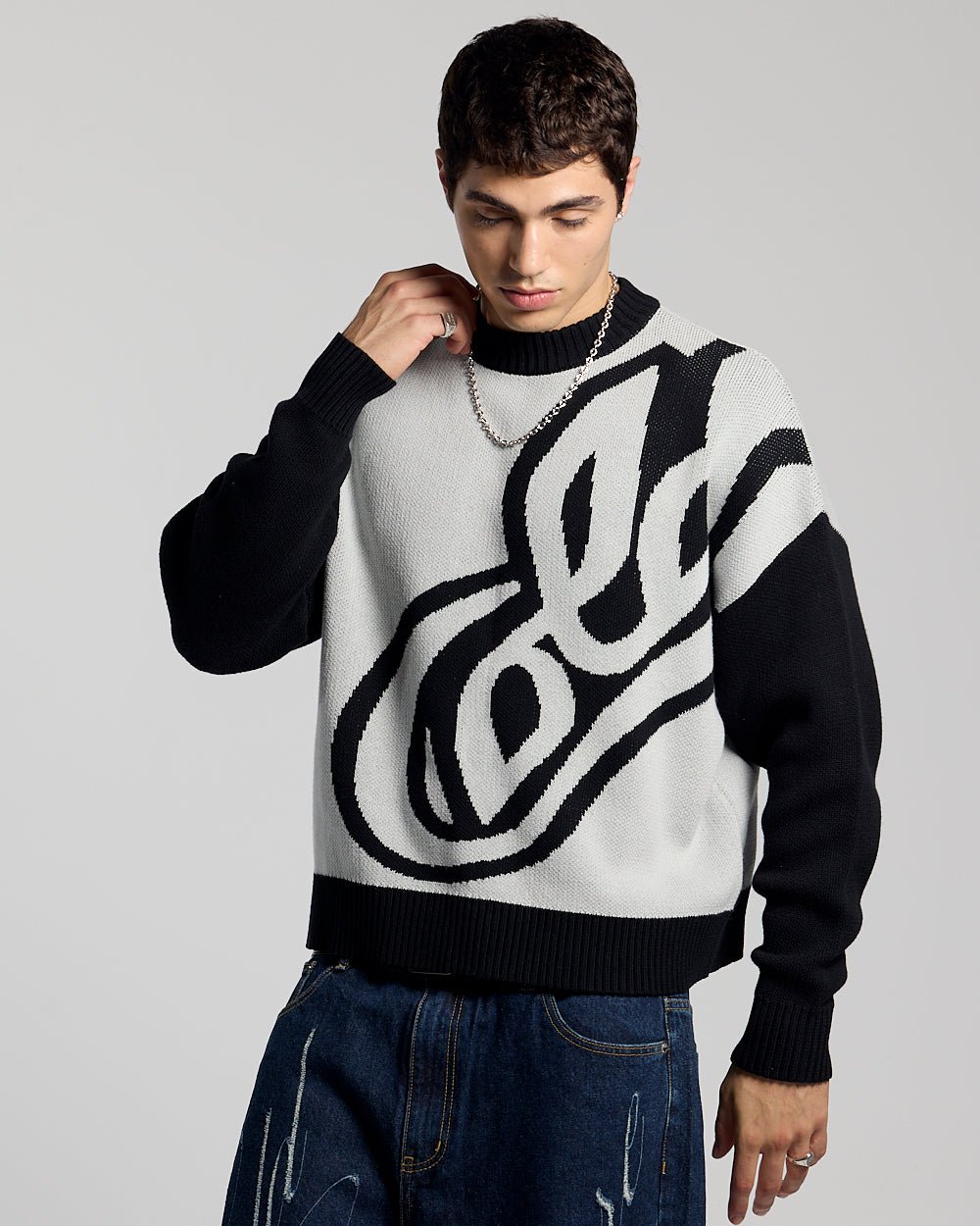 RAGE KNIT GREY - grey and black script knit sweater, front view on male model - Cold Culture #man