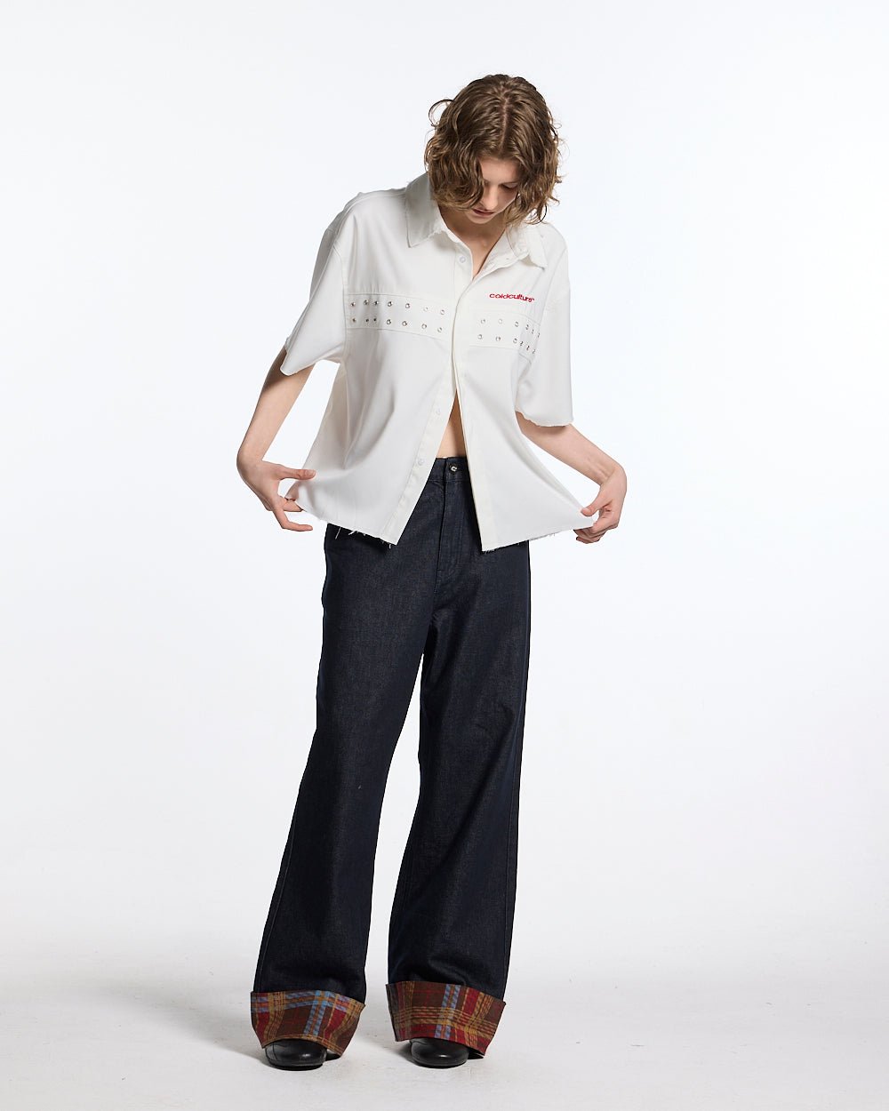 RAINY TARTAN V3 PANTS - navy denim pants with tartan cuffs, front view on female model - Cold Culture #woman