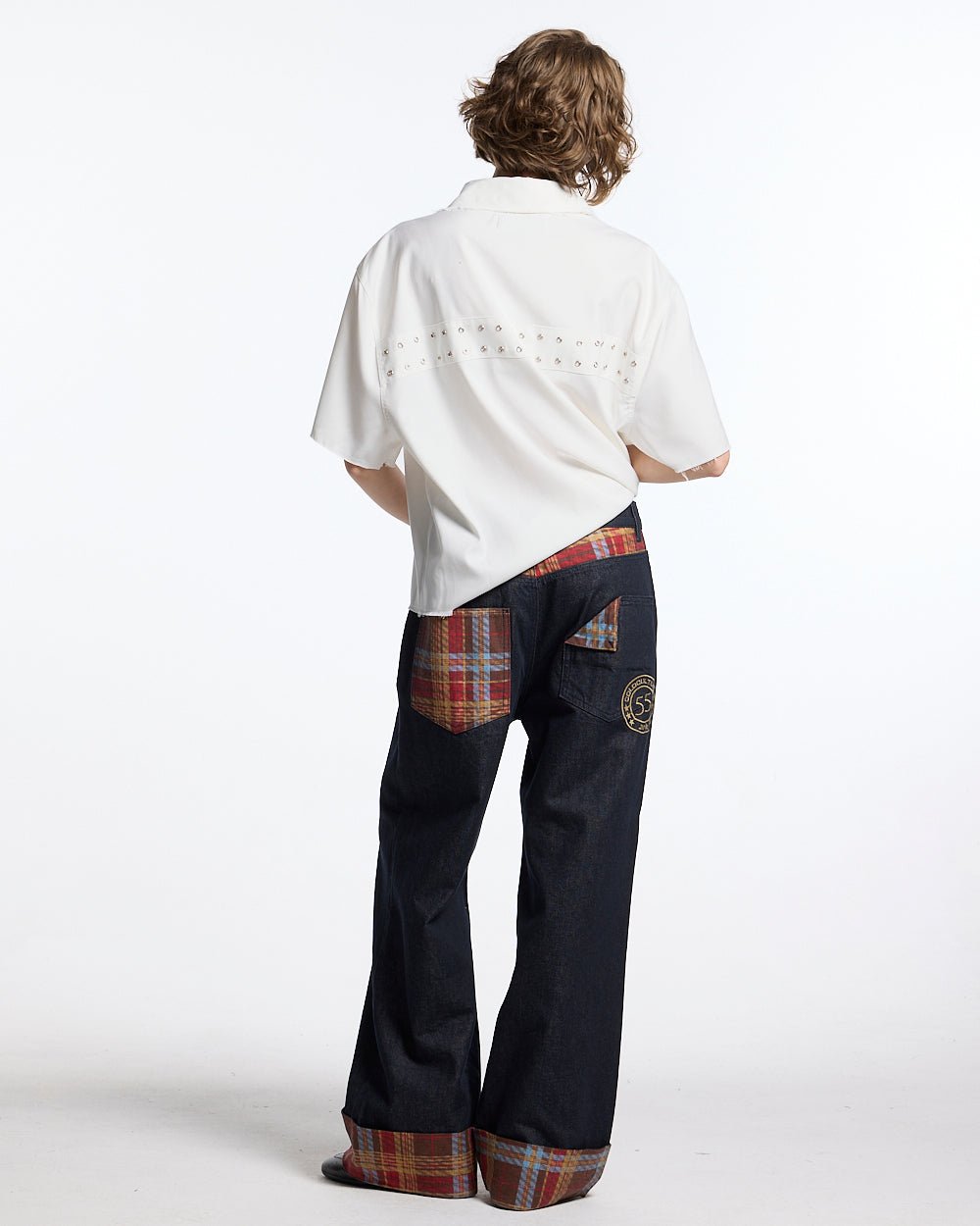 RAINY TARTAN V3 PANTS - navy denim pants with tartan cuffs, back view on female model - Cold Culture #woman