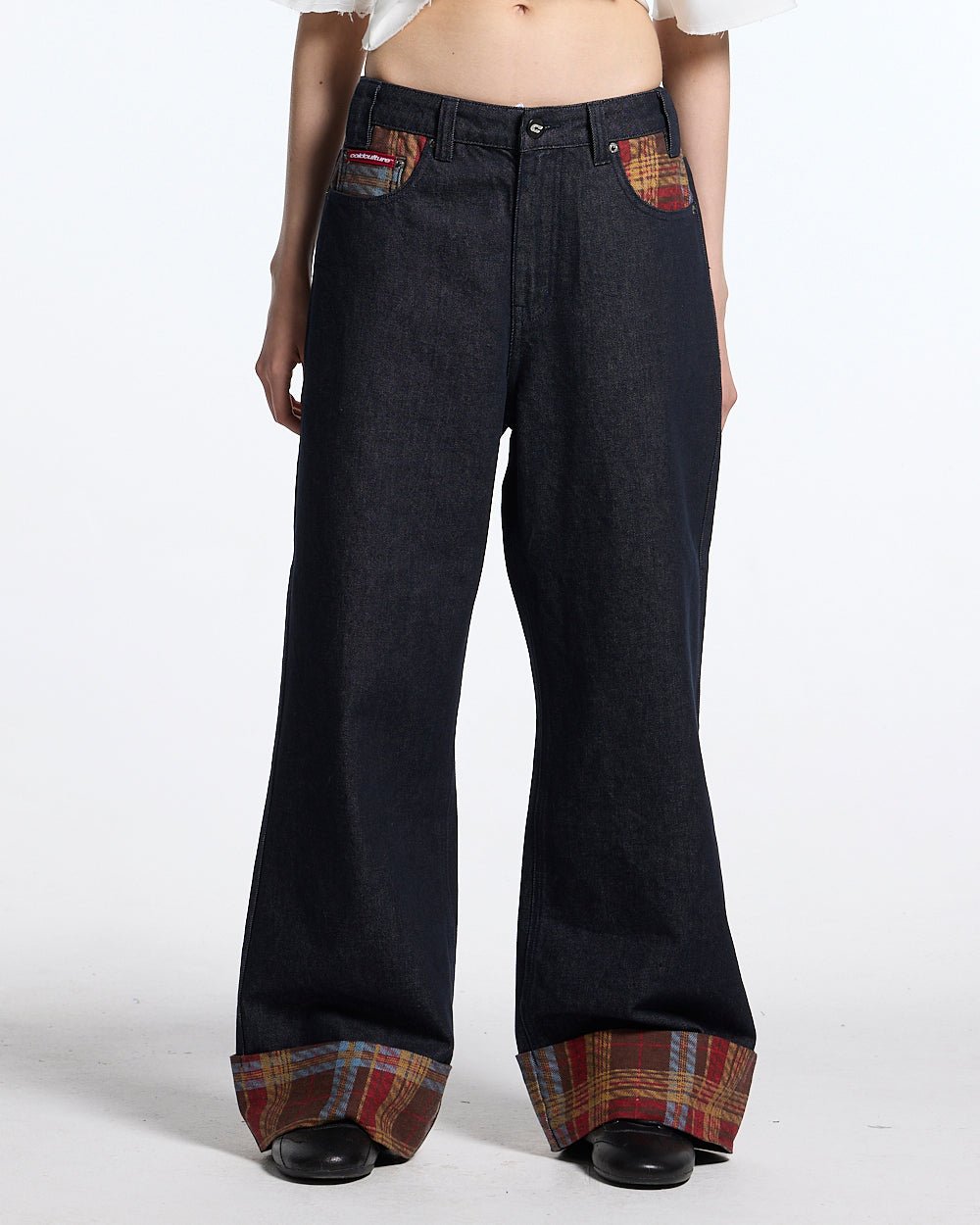 RAINY TARTAN V3 PANTS - navy denim pants with tartan cuffs, front view on female model - Cold Culture #woman