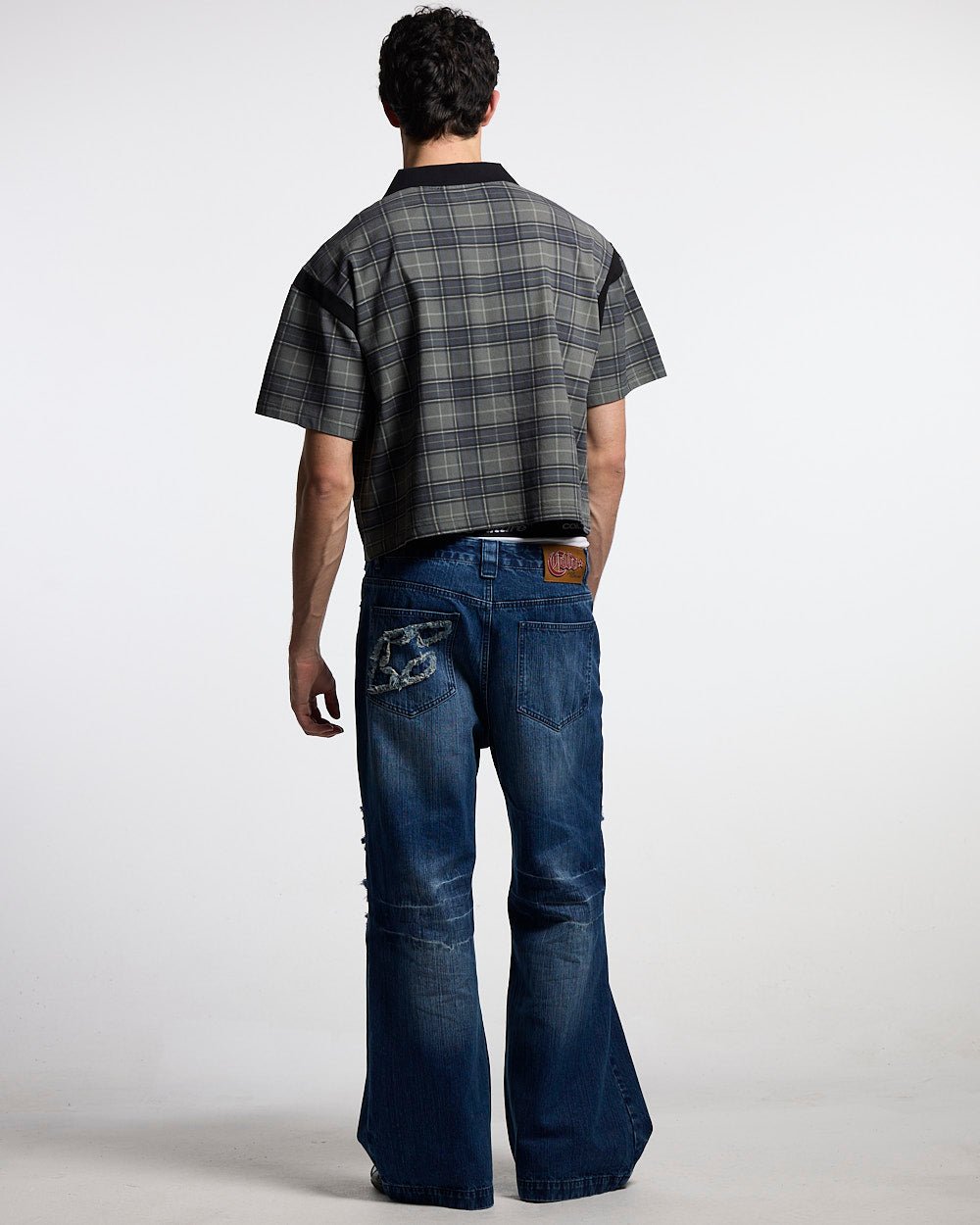 RAW CITY POLO TARTAN - grey tartan polo shirt, back view on male model - Cold Culture #man