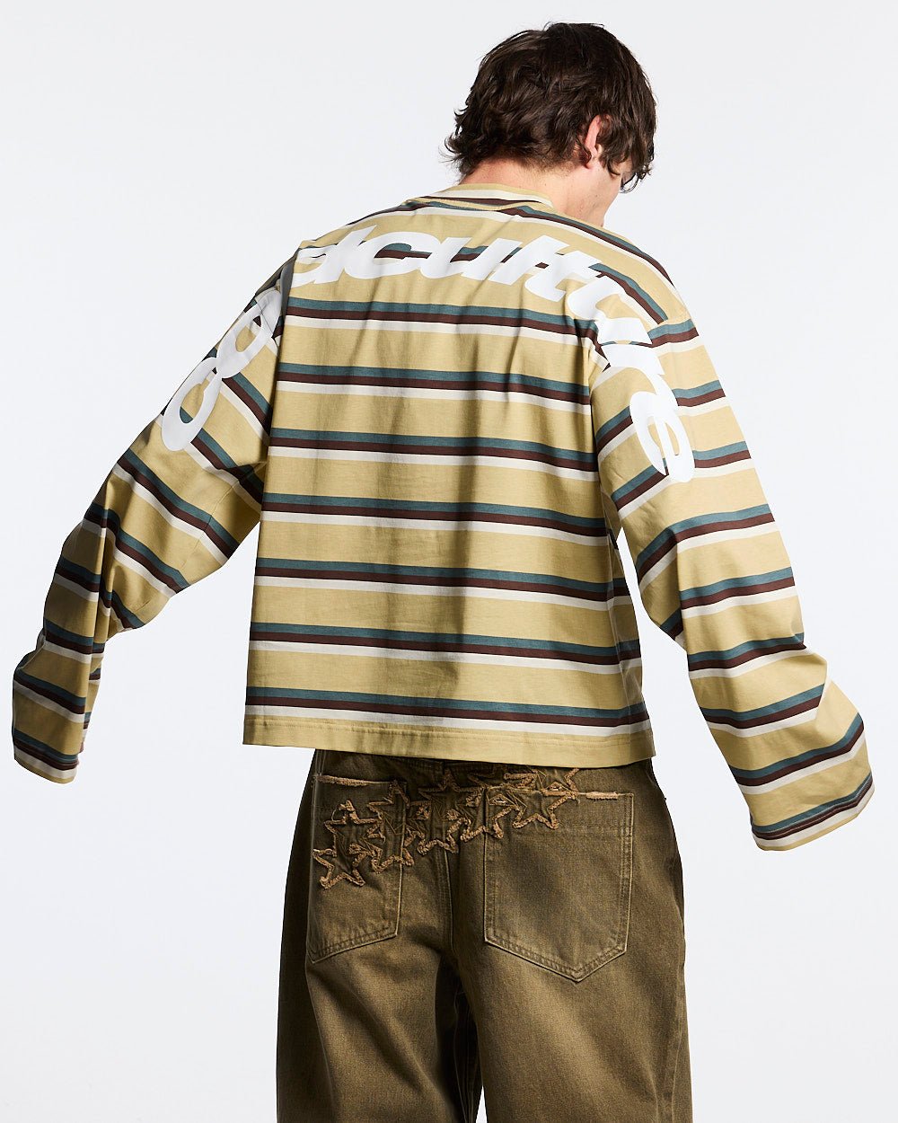 RAY CURVED LONGSLEEVE YELLOW & BROWN - yellow striped longsleeve tee, back view on male model - Cold Culture #man