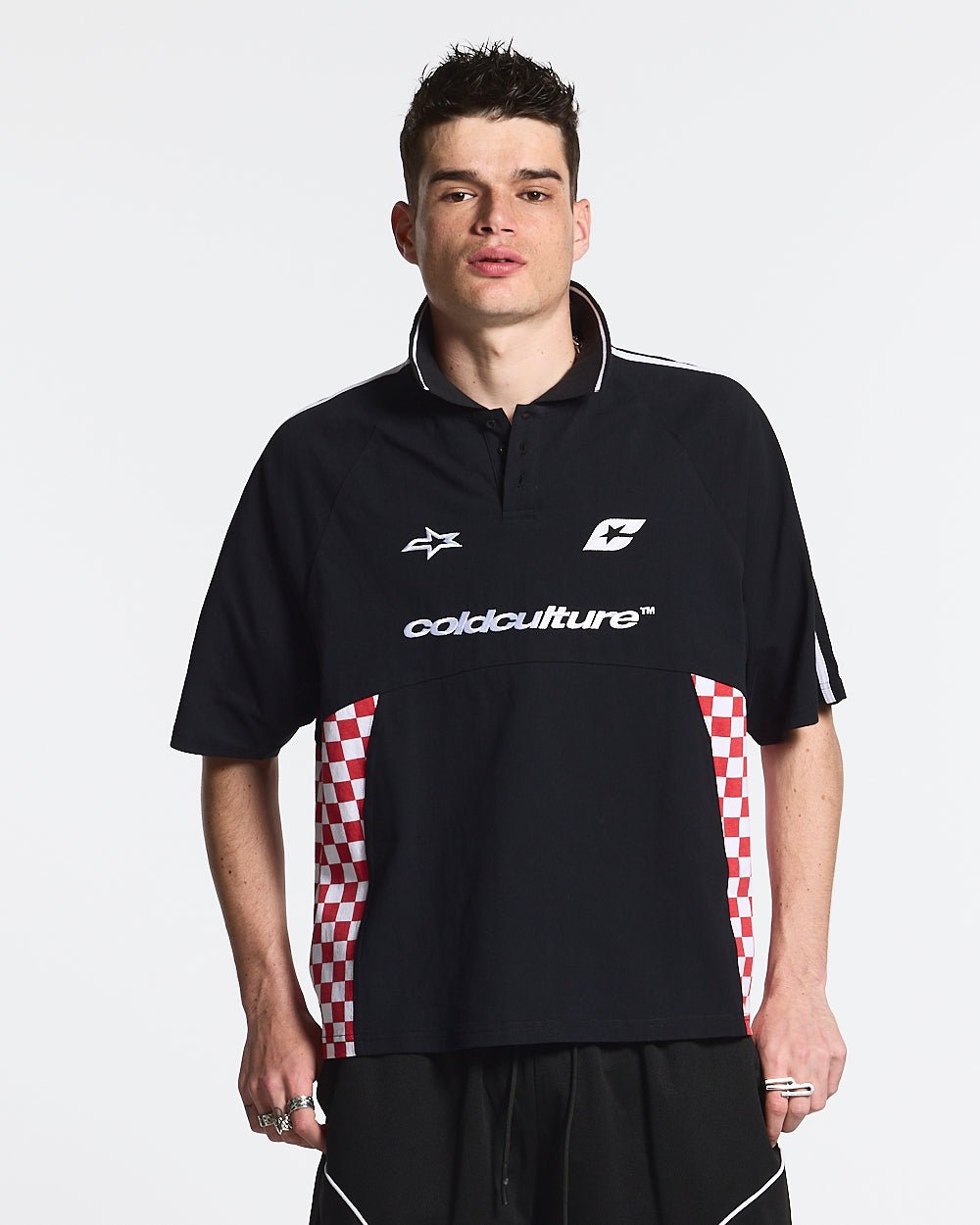 RED CHESS POLO TSHIRT BLACK - black checkered polo shirt, front view on male model - Cold Culture #man