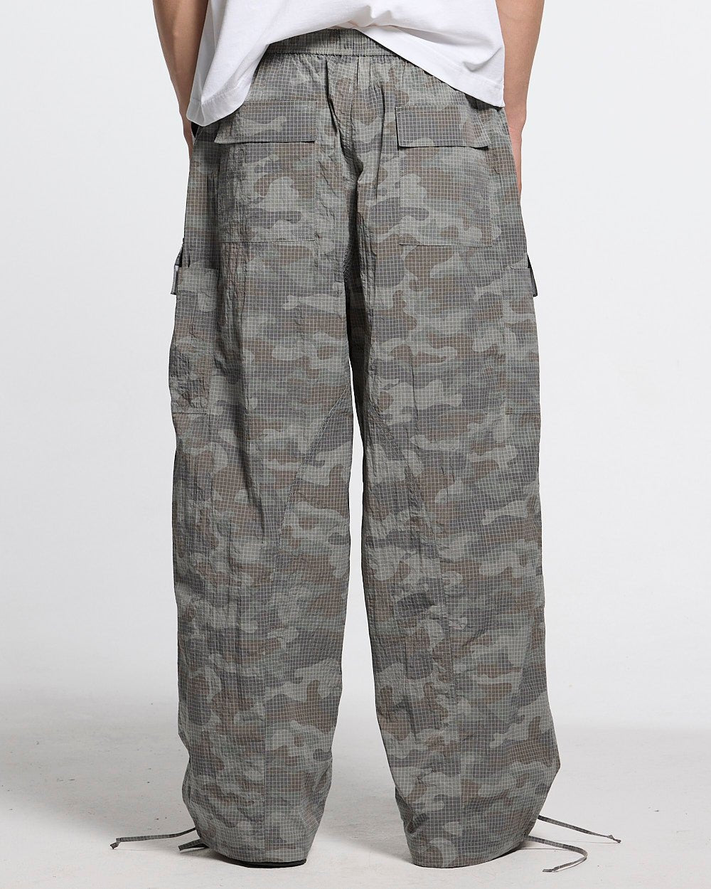 RESERVED CARGO PANTS CAMO - grey camo cargo pants, back view on male model - Cold Culture