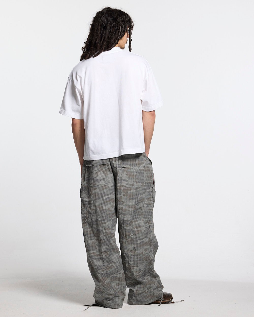 RESERVED CARGO PANTS CAMO - grey camo cargo pants, back view on male model - Cold Culture #man