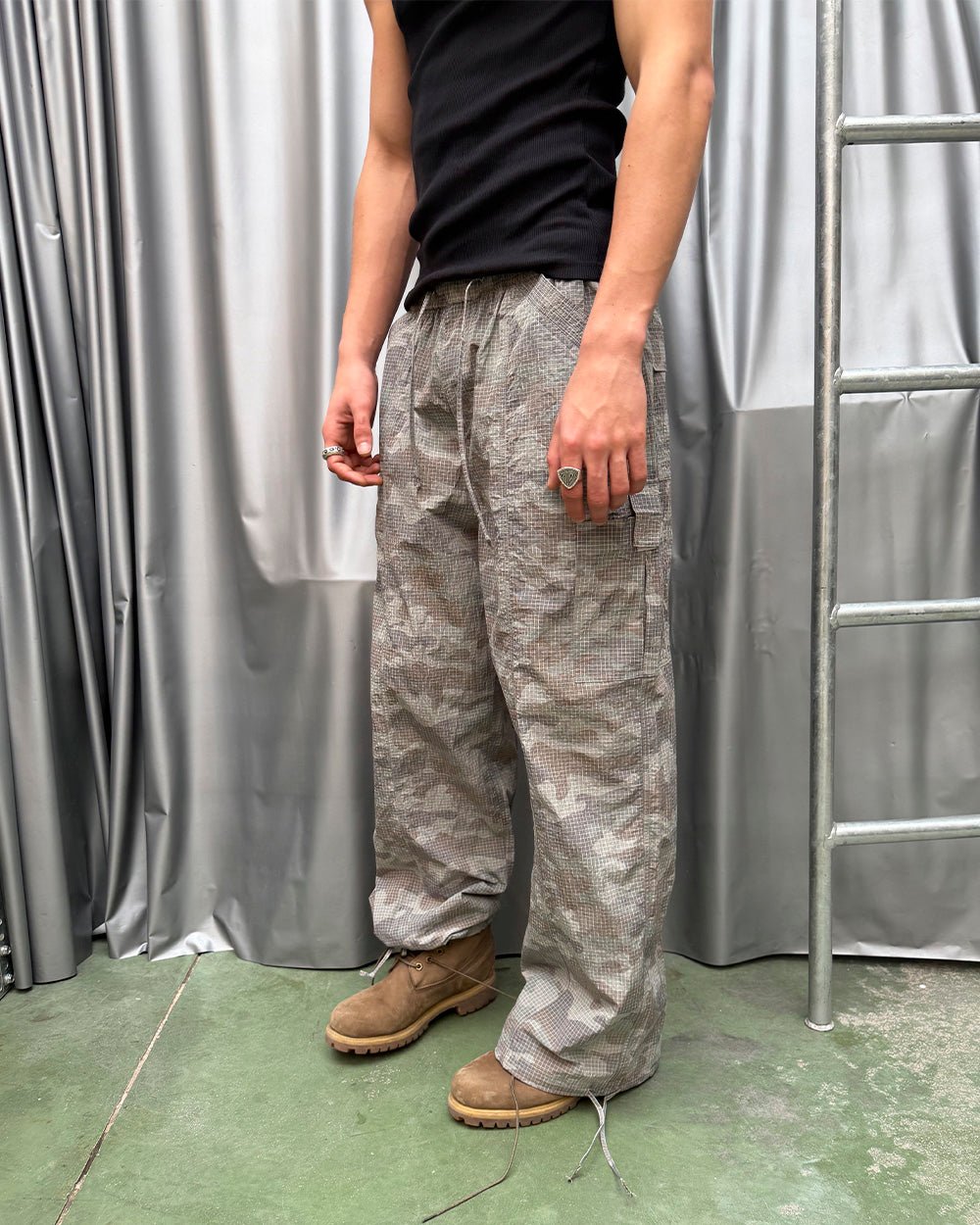RESERVED CARGO PANTS CAMO - grey camo cargo pants, street style shot - Cold Culture