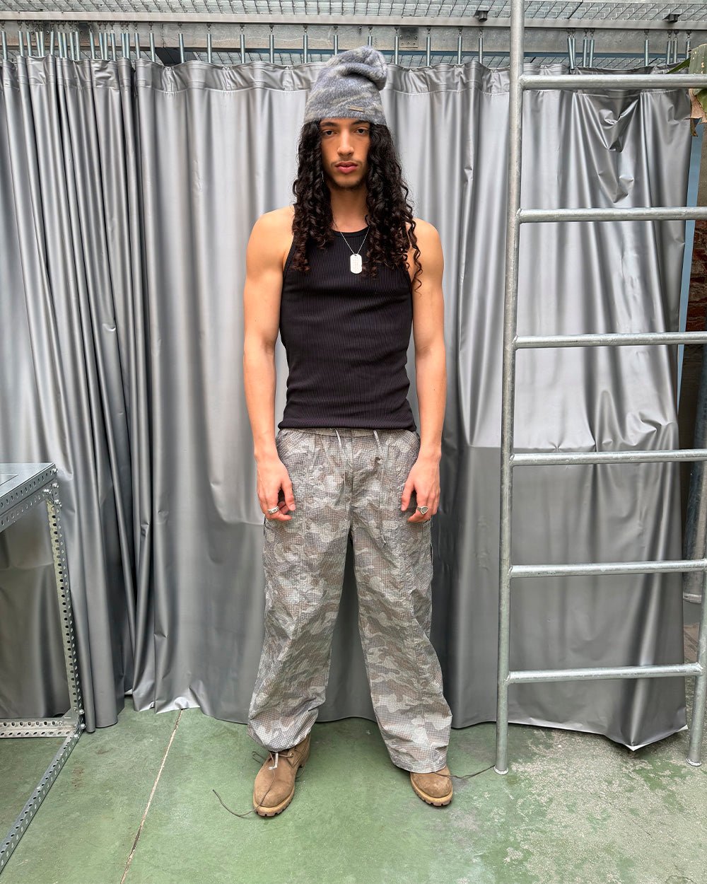 RESERVED CARGO PANTS CAMO - grey camo cargo pants, street style shot - Cold Culture