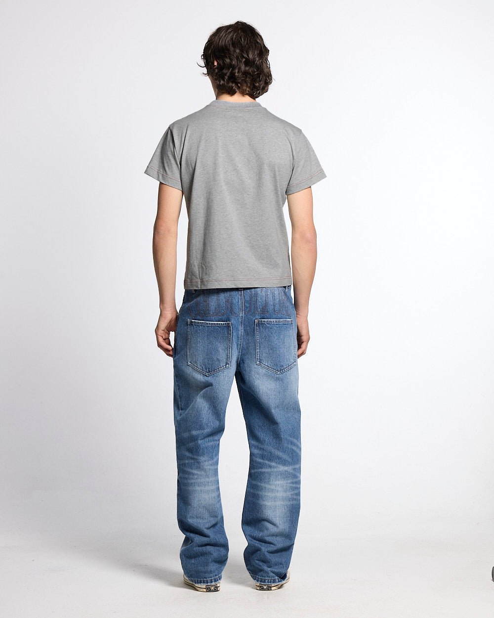 REVERSED V1 REGULAR PANTS MEDIUM DENIM - medium blue denim pants, back view on male model - Cold Culture #man