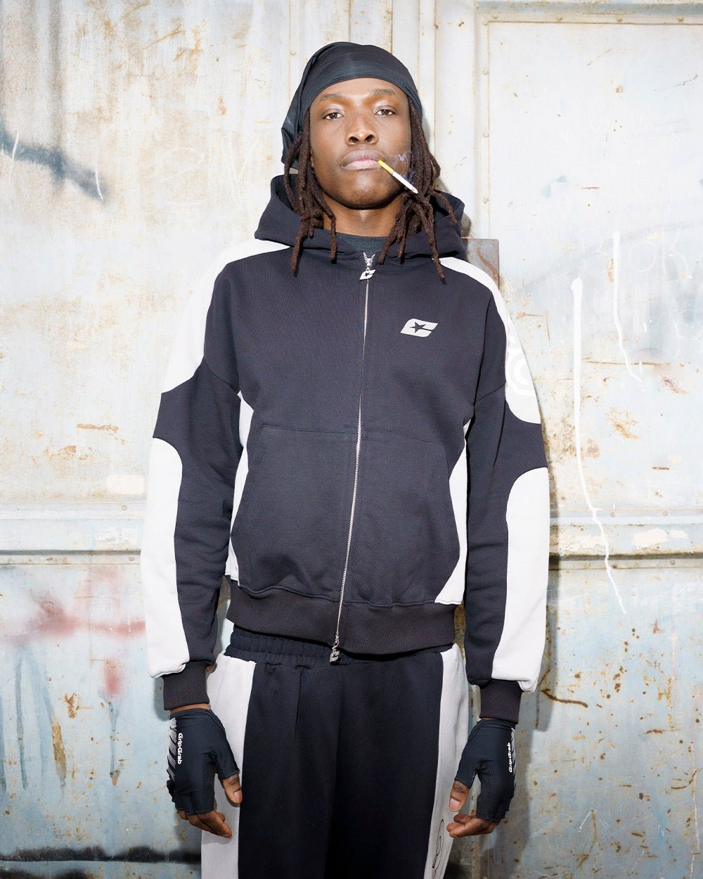 RIDER ZIP HOODIE BLACK & GREY - black and grey zip-up hoodie, street style shot - Cold Culture