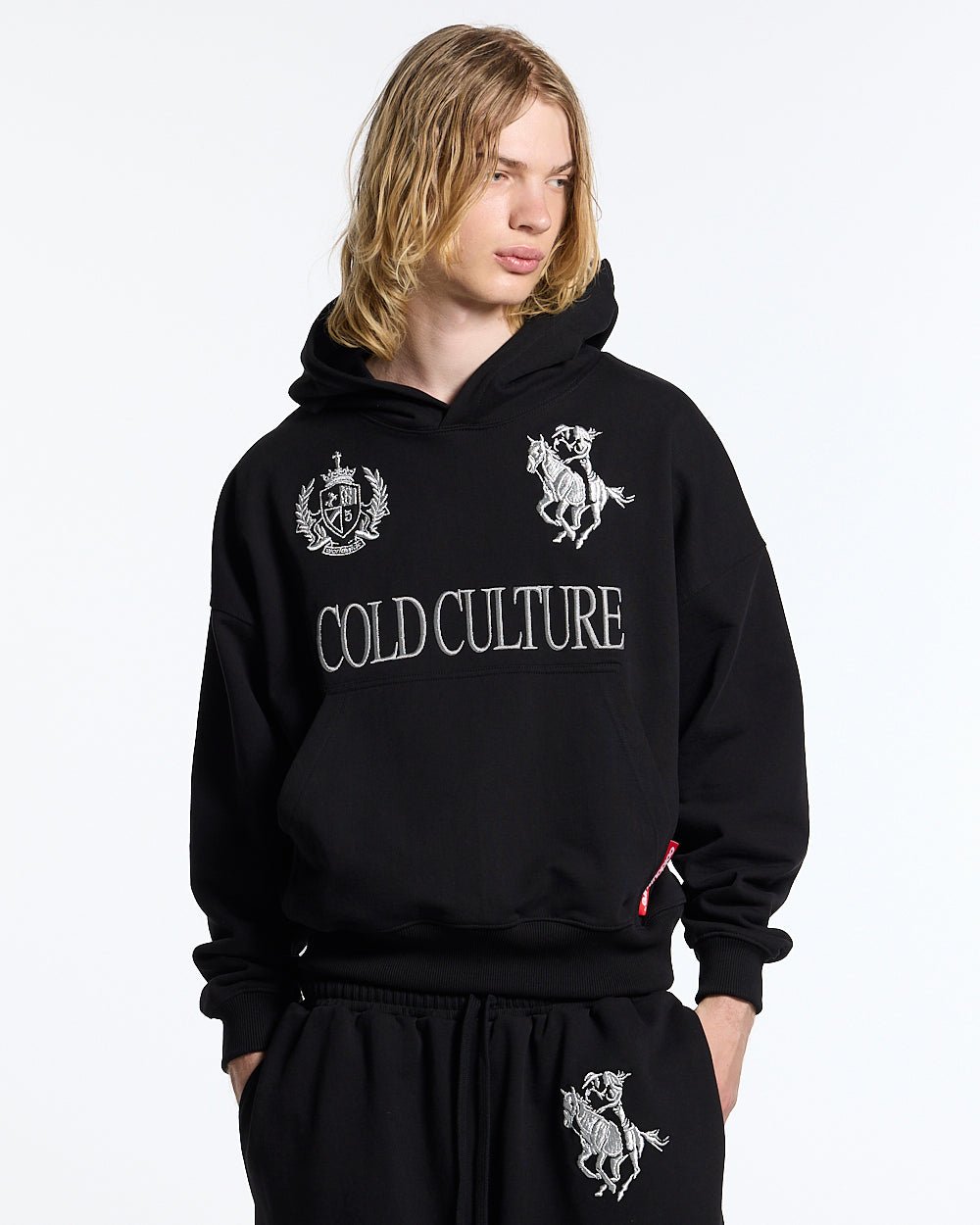 RIDING CLUB HOODIE BLACK - black embroidered hoodie, front view on male model - Cold Culture #man