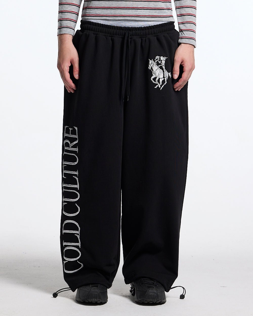 RIDING CLUB SWEATPANTS BLACK - black embroidered sweatpants, front view on male model - Cold Culture