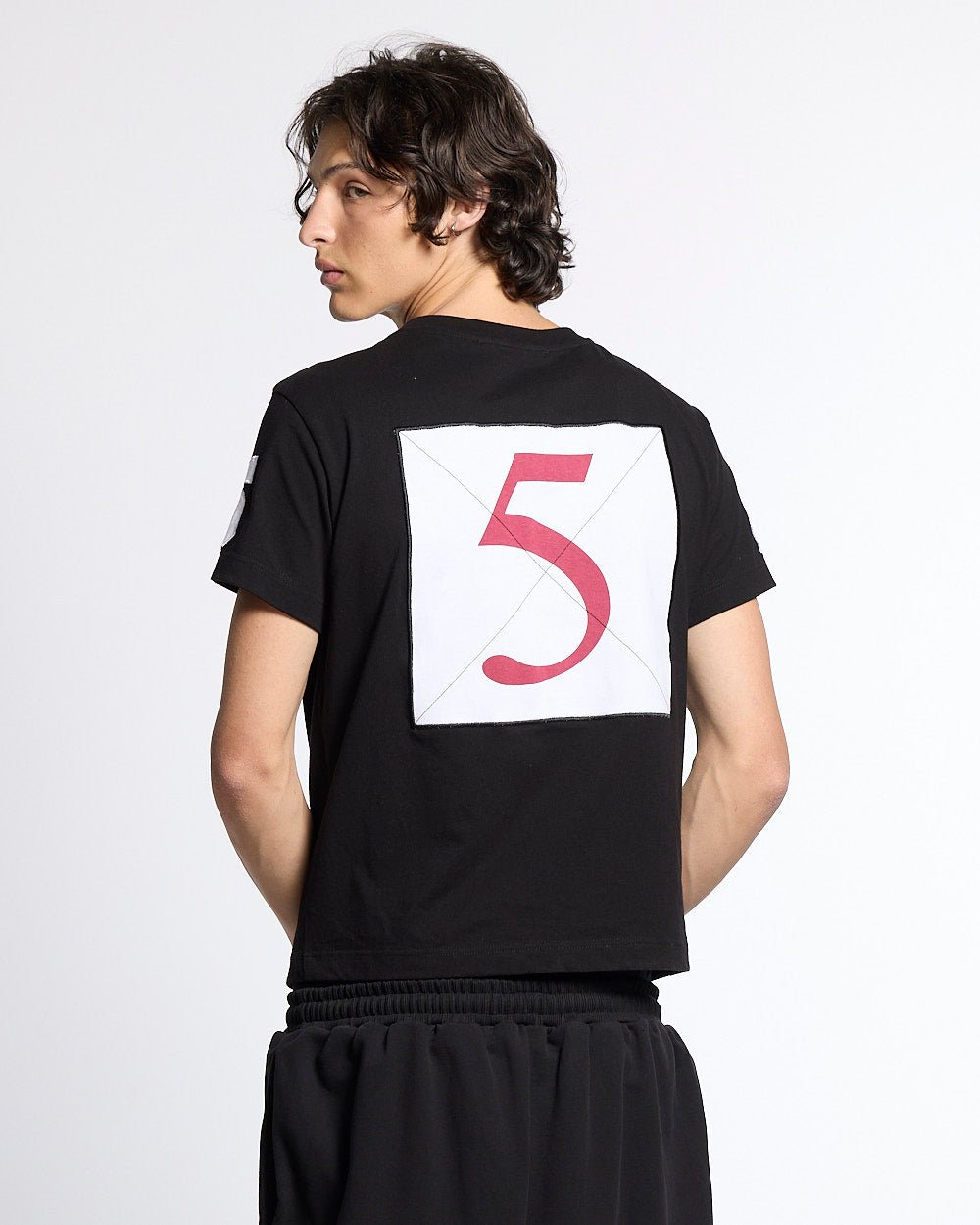 RIDING CLUB TEE BLACK - black polo rider print tee, back view on male model - Cold Culture #man