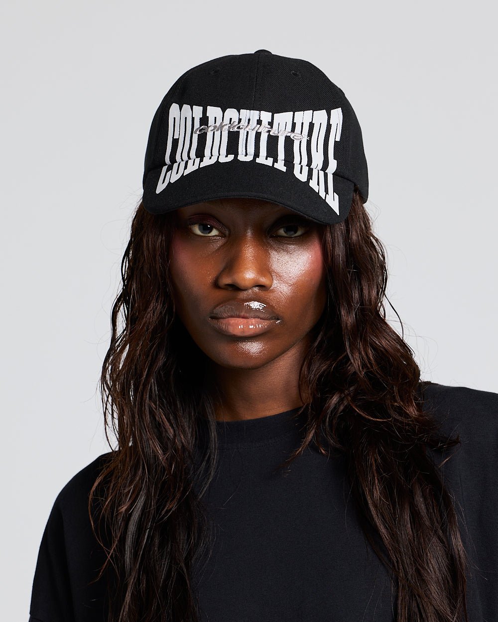 RIOT CAP BLACK - black logo print cap, on model close-up - Cold Culture #woman