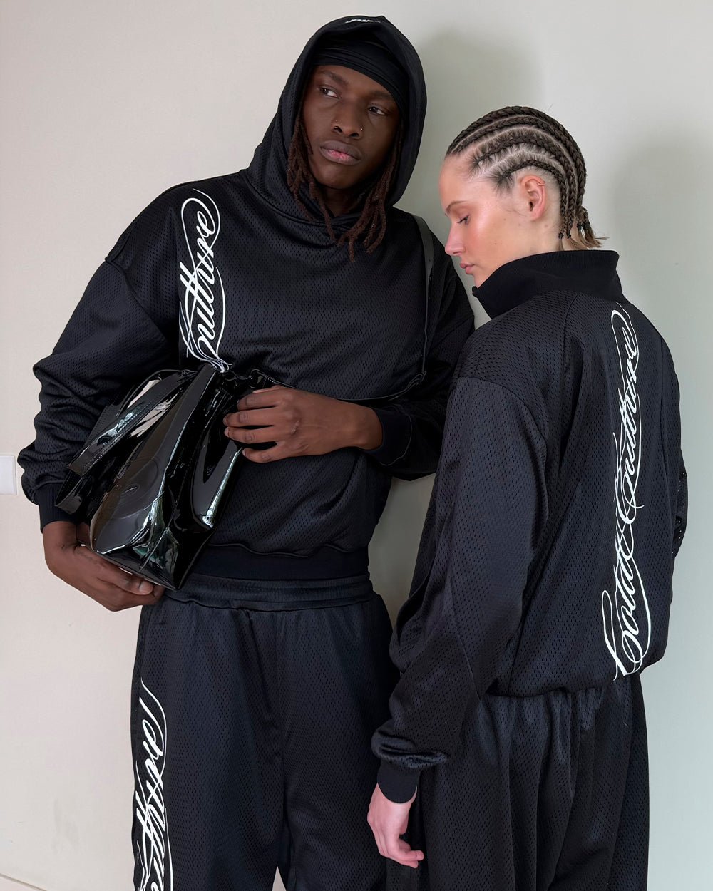 RIOT MESH HOODIE BLACK - black mesh hoodie, street style shot - Cold Culture