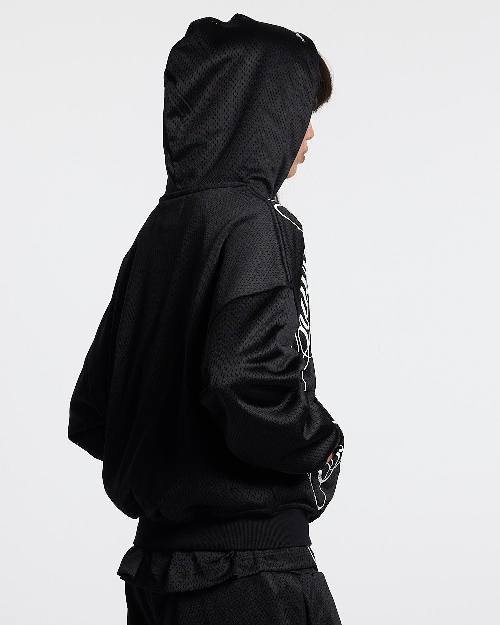 RIOT MESH HOODIE BLACK - black mesh hoodie, side view - Cold Culture