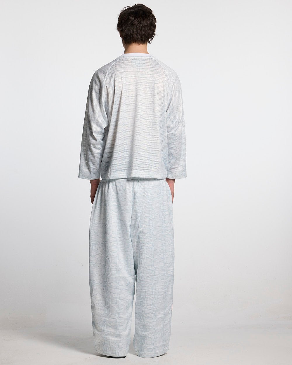 RIOT MESH LONGSLEEVE WHITE - white mesh longsleeve tee, back view on male model - Cold Culture #man