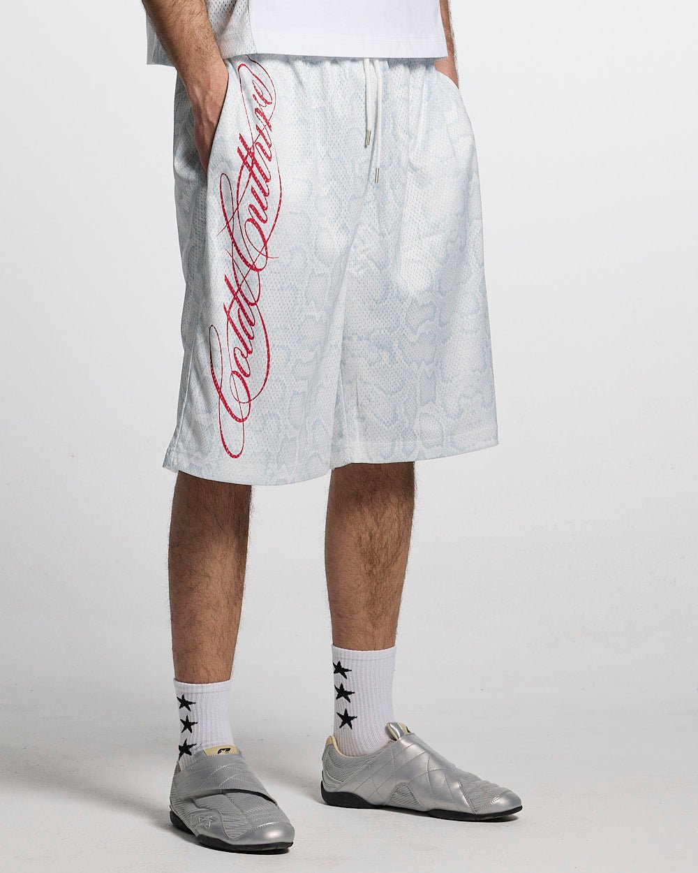 RIOT MESH SHORT WHITE - white snake print mesh shorts, front view on male model - Cold Culture