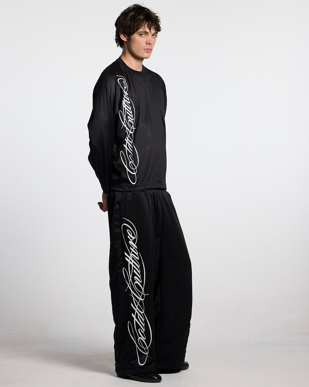 RIOT MESH SWEATPANTS BLACK - black mesh sweatpants, side view - Cold Culture #man