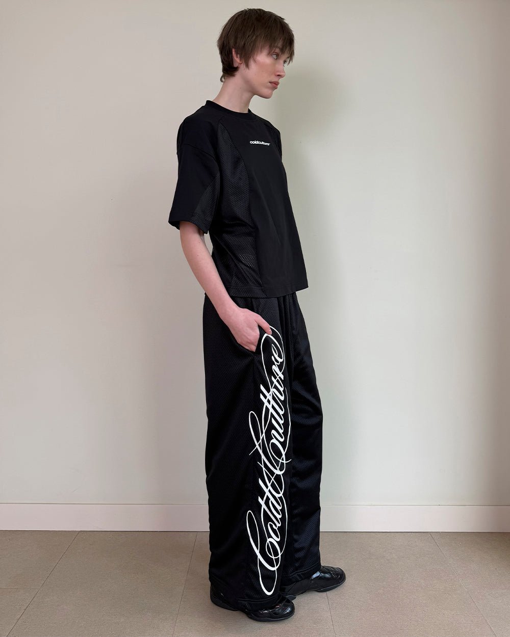RIOT MESH SWEATPANTS BLACK - black mesh sweatpants, side view - Cold Culture #woman