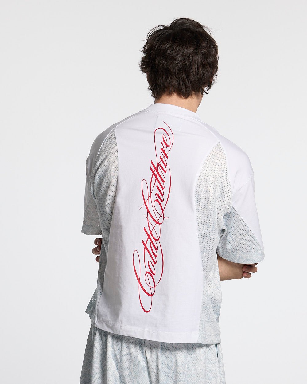 RIOT MESH TEE WHITE - white mesh panel tee, back view on male model - Cold Culture #man